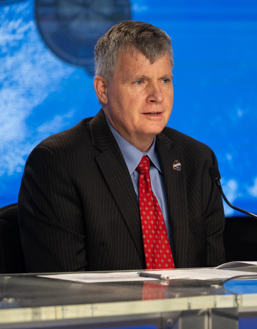 Steve Stich, manager of NASA's Commercial Crew Program, is seen during a press conference after the first launch attempt of NASA’s Boeing Crew Flight Test was scrubbed for the day, Monday, May 6, 2024, at NASA’s Kennedy Space Center in Florida. NASA’s Boeing Crew Flight Test is the first launch with astronauts of the Boeing CFT-100 spacecraft and United Launch Alliance Atlas V rocket to the International Space Station as part of the agency’s Commercial Crew Program. The flight test, targeted for launch no earlier than Friday, May 10, serves as an end-to-end demonstration of Boeing’s crew transportation system and will carry NASA astronauts Butch Wilmore and Suni Williams to and from the orbiting laboratory. Photo Credit: (NASA/Joel Kowsky)