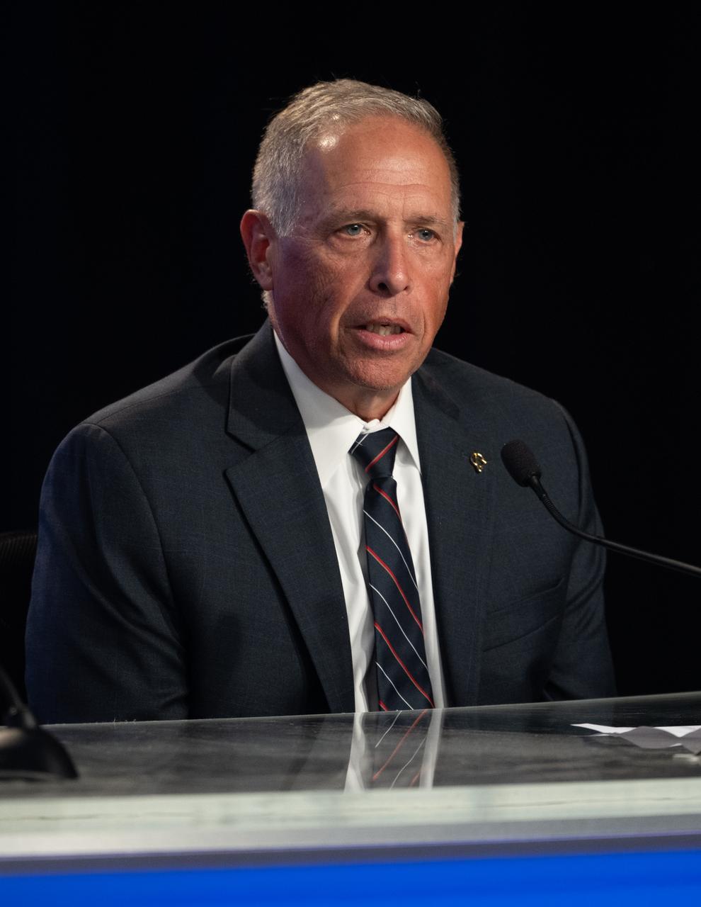 Mark Nappi, vice president and program manager for the Commercial Crew Program at Boeing, is seen during a press conference after the first launch attempt of NASA’s Boeing Crew Flight Test was scrubbed for the day, Monday, May 6, 2024, at NASA’s Kennedy Space Center in Florida. NASA’s Boeing Crew Flight Test is the first launch with astronauts of the Boeing CFT-100 spacecraft and United Launch Alliance Atlas V rocket to the International Space Station as part of the agency’s Commercial Crew Program. The flight test, targeted for launch no earlier than Friday, May 10, serves as an end-to-end demonstration of Boeing’s crew transportation system and will carry NASA astronauts Butch Wilmore and Suni Williams to and from the orbiting laboratory. Photo Credit: (NASA/Joel Kowsky)