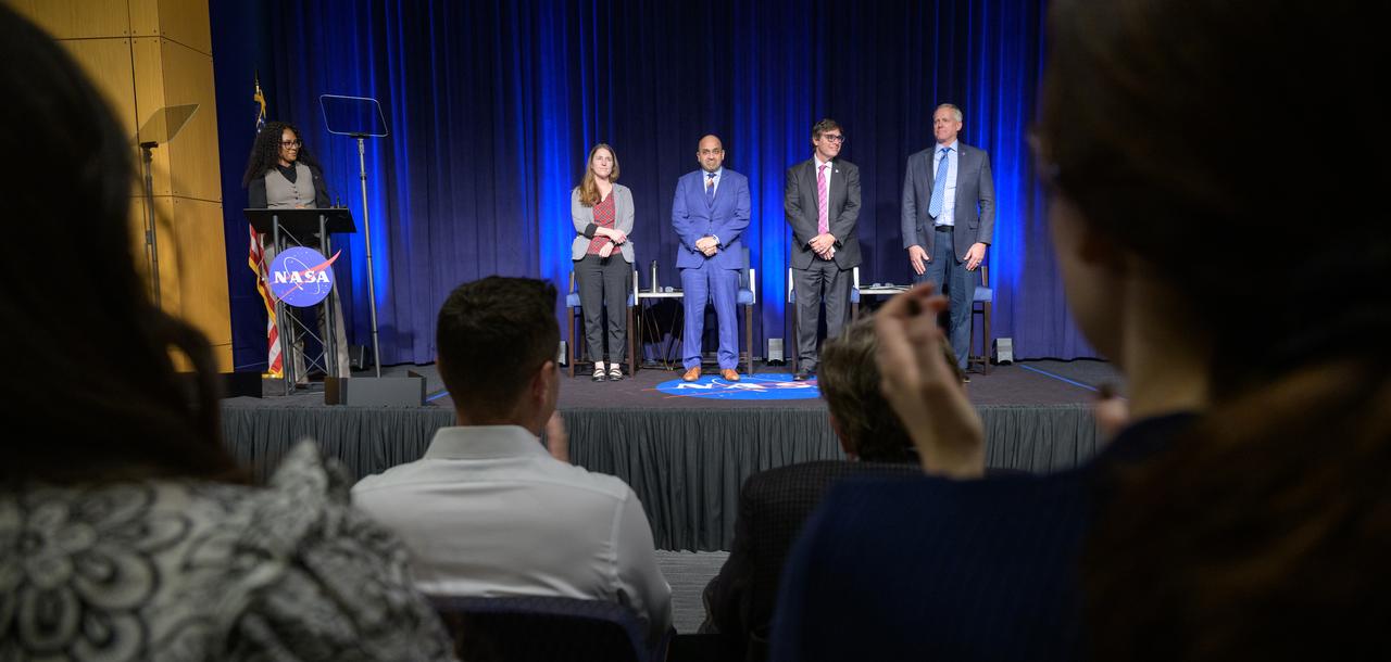 NASA Public Affairs Specialist Melissa Howell, left, NASA Chief Scientist Kate Calvin, NASA Chief Technologist A.C. Charania, NASA Chief Artificial Intelligence Officer David Salvagnini, and NASA Chief Information Officer Jeff Seaton, right, participate in a NASA employee town hall on how the agency is using and developing Artificial Intelligence (AI) tools to advance missions and research, Wednesday, May 22, 2024, at the NASA Headquarters Mary W. Jackson Building in Washington. Photo Credit: (NASA/Bill Ingalls)