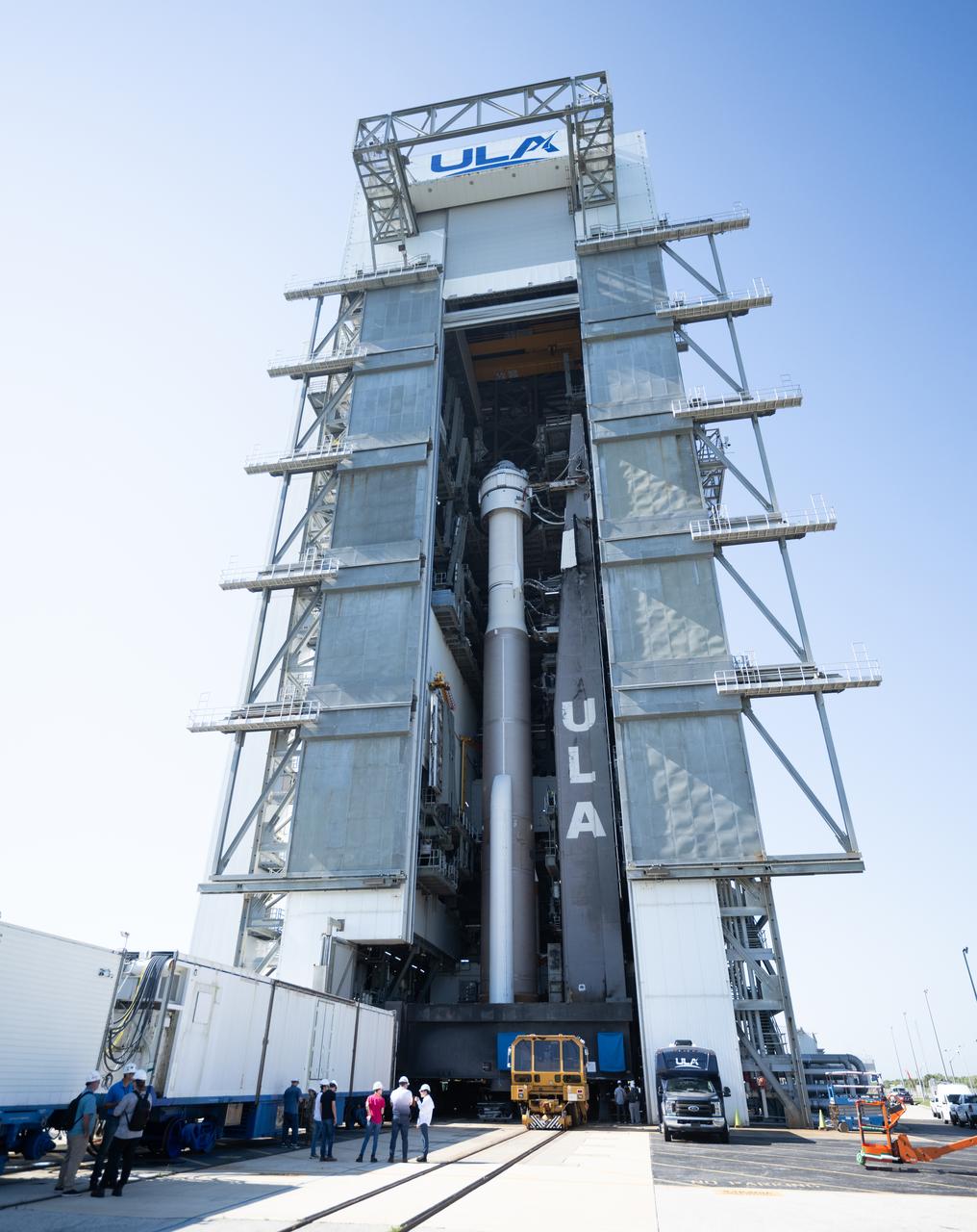 A United Launch Alliance Atlas V rocket with Boeing’s CST-100 Starliner spacecraft aboard is seen inside the Vertical Integration Facility before being rolled out to the launch pad at Space Launch Complex 41 ahead of the NASA’s Boeing Crew Flight Test, Thursday, May 30, 2024 at Cape Canaveral Space Force Station in Florida. NASA’s Boeing Crew Flight Test is the first launch with astronauts of the Boeing CFT-100 spacecraft and United Launch Alliance Atlas V rocket to the International Space Station as part of the agency’s Commercial Crew Program. The flight test, targeted for launch at 12:25 p.m. EDT on Saturday, June 1, serves as an end-to-end demonstration of Boeing’s crew transportation system and will carry NASA astronauts Butch Wilmore and Suni Williams to and from the orbiting laboratory. Photo Credit: (NASA/Joel Kowsky)