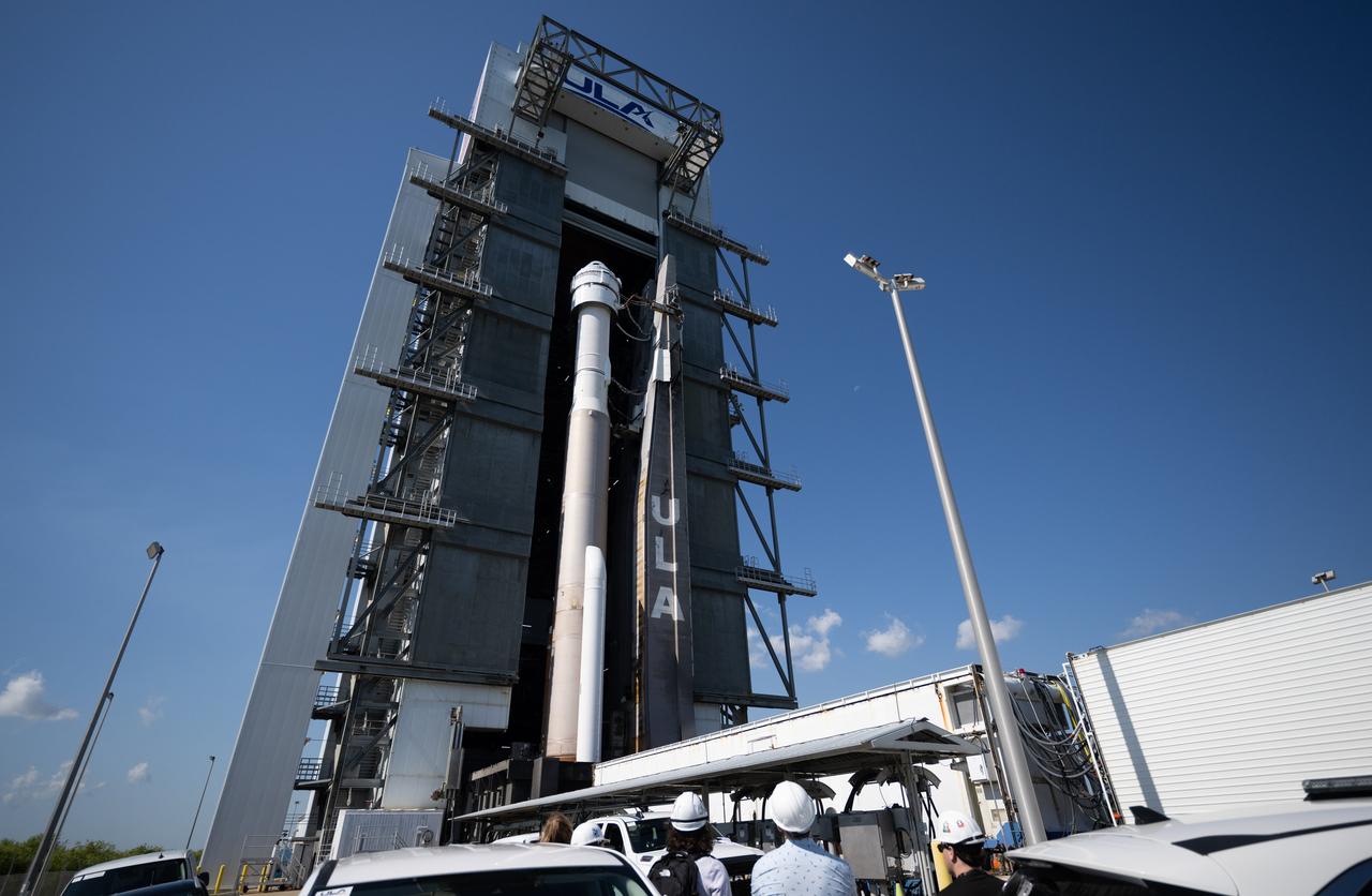 A United Launch Alliance Atlas V rocket with Boeing’s CST-100 Starliner spacecraft aboard is seen as it is rolled out of the Vertical Integration Facility to the launch pad at Space Launch Complex 41 ahead of the NASA’s Boeing Crew Flight Test, Thursday, May 30, 2024 at Cape Canaveral Space Force Station in Florida. NASA’s Boeing Crew Flight Test is the first launch with astronauts of the Boeing CFT-100 spacecraft and United Launch Alliance Atlas V rocket to the International Space Station as part of the agency’s Commercial Crew Program. The flight test, targeted for launch at 12:25 p.m. EDT on Saturday, June 1, serves as an end-to-end demonstration of Boeing’s crew transportation system and will carry NASA astronauts Butch Wilmore and Suni Williams to and from the orbiting laboratory. Photo Credit: (NASA/Joel Kowsky)