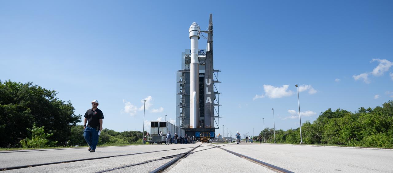 A United Launch Alliance Atlas V rocket with Boeing’s CST-100 Starliner spacecraft aboard is seen as it is rolled out of the Vertical Integration Facility to the launch pad at Space Launch Complex 41 ahead of the NASA’s Boeing Crew Flight Test, Thursday, May 30, 2024 at Cape Canaveral Space Force Station in Florida. NASA’s Boeing Crew Flight Test is the first launch with astronauts of the Boeing CFT-100 spacecraft and United Launch Alliance Atlas V rocket to the International Space Station as part of the agency’s Commercial Crew Program. The flight test, targeted for launch at 12:25 p.m. EDT on Saturday, June 1, serves as an end-to-end demonstration of Boeing’s crew transportation system and will carry NASA astronauts Butch Wilmore and Suni Williams to and from the orbiting laboratory. Photo Credit: (NASA/Joel Kowsky)