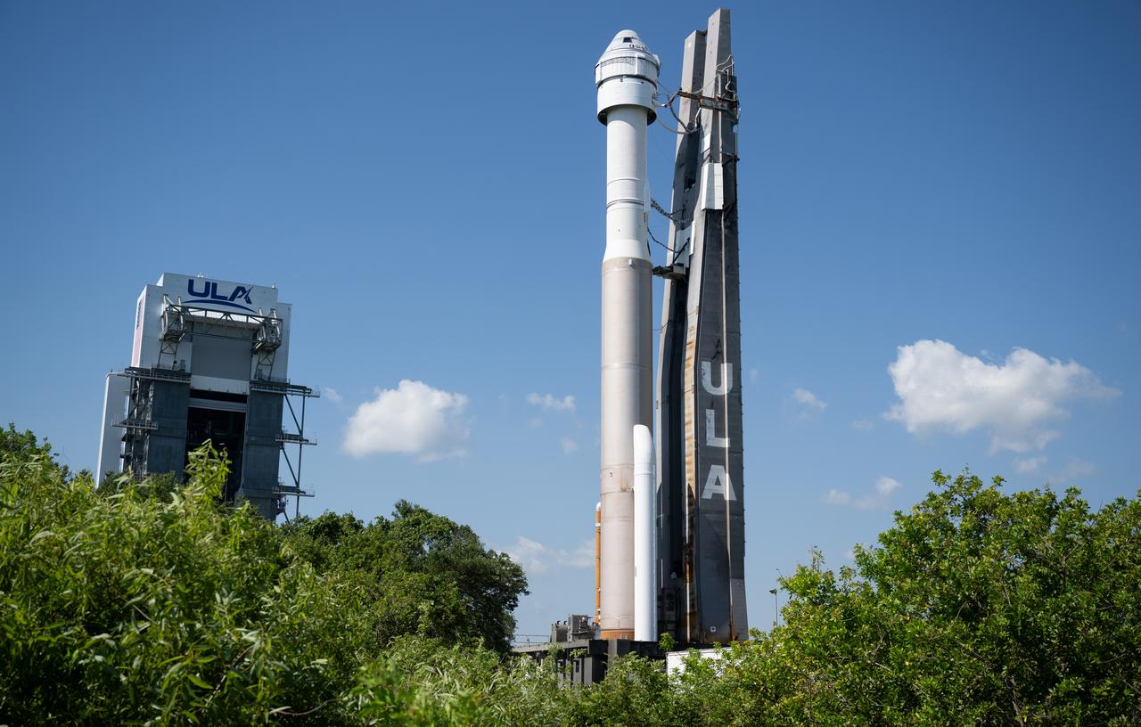 A United Launch Alliance Atlas V rocket with Boeing’s CST-100 Starliner spacecraft aboard is seen as it is rolled out of the Vertical Integration Facility to the launch pad at Space Launch Complex 41 ahead of the NASA’s Boeing Crew Flight Test, Thursday, May 30, 2024 at Cape Canaveral Space Force Station in Florida. NASA’s Boeing Crew Flight Test is the first launch with astronauts of the Boeing CFT-100 spacecraft and United Launch Alliance Atlas V rocket to the International Space Station as part of the agency’s Commercial Crew Program. The flight test, targeted for launch at 12:25 p.m. EDT on Saturday, June 1, serves as an end-to-end demonstration of Boeing’s crew transportation system and will carry NASA astronauts Butch Wilmore and Suni Williams to and from the orbiting laboratory. Photo Credit: (NASA/Joel Kowsky)