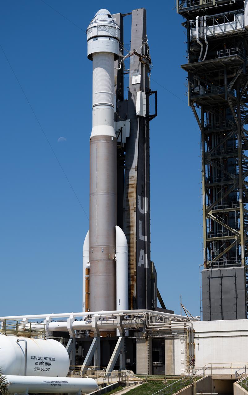 A United Launch Alliance Atlas V rocket with Boeing’s CST-100 Starliner spacecraft aboard is seen after being rolled out of the Vertical Integration Facility to the launch pad at Space Launch Complex 41 ahead of the NASA’s Boeing Crew Flight Test, Thursday, May 30, 2024 at Cape Canaveral Space Force Station in Florida. NASA’s Boeing Crew Flight Test is the first launch with astronauts of the Boeing CFT-100 spacecraft and United Launch Alliance Atlas V rocket to the International Space Station as part of the agency’s Commercial Crew Program. The flight test, targeted for launch at 12:25 p.m. EDT on Saturday, June 1, serves as an end-to-end demonstration of Boeing’s crew transportation system and will carry NASA astronauts Butch Wilmore and Suni Williams to and from the orbiting laboratory. Photo Credit: (NASA/Joel Kowsky)