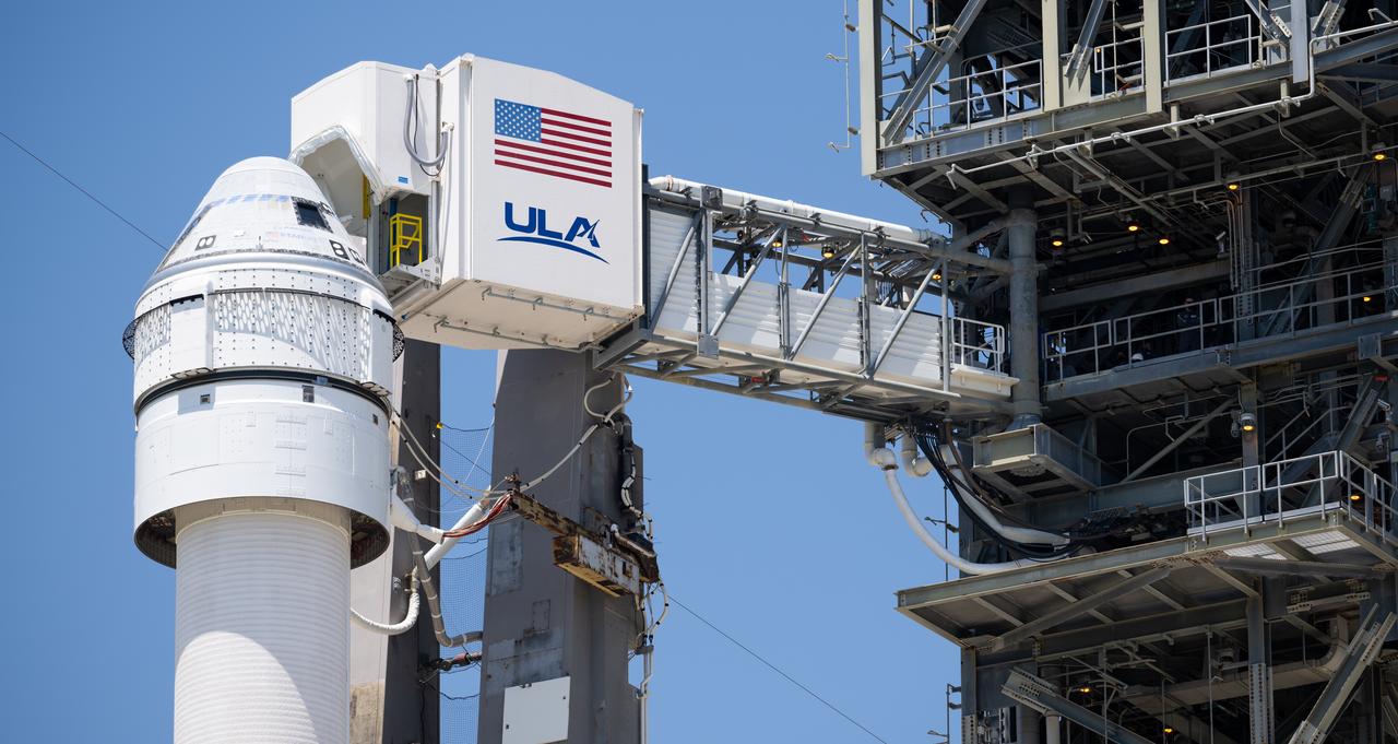 The crew access arm is seen as it is swung into position after a United Launch Alliance Atlas V rocket with Boeing’s CST-100 Starliner spacecraft aboard was rolled out of the Vertical Integration Facility to the launch pad at Space Launch Complex 41 ahead of the NASA’s Boeing Crew Flight Test, Thursday, May 30, 2024 at Cape Canaveral Space Force Station in Florida. NASA’s Boeing Crew Flight Test is the first launch with astronauts of the Boeing CFT-100 spacecraft and United Launch Alliance Atlas V rocket to the International Space Station as part of the agency’s Commercial Crew Program. The flight test, targeted for launch at 12:25 p.m. EDT on Saturday, June 1, serves as an end-to-end demonstration of Boeing’s crew transportation system and will carry NASA astronauts Butch Wilmore and Suni Williams to and from the orbiting laboratory. Photo Credit: (NASA/Joel Kowsky)