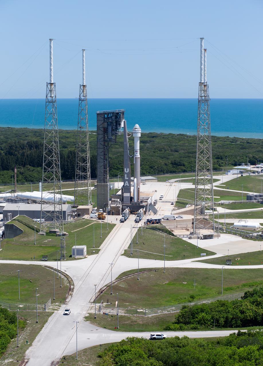 A United Launch Alliance Atlas V rocket with Boeing’s CST-100 Starliner spacecraft aboard is seen after being rolled out of the Vertical Integration Facility to the launch pad at Space Launch Complex 41 ahead of the NASA’s Boeing Crew Flight Test, Thursday, May 30, 2024 at Cape Canaveral Space Force Station in Florida. NASA’s Boeing Crew Flight Test is the first launch with astronauts of the Boeing CFT-100 spacecraft and United Launch Alliance Atlas V rocket to the International Space Station as part of the agency’s Commercial Crew Program. The flight test, targeted for launch at 12:25 p.m. EDT on Saturday, June 1, serves as an end-to-end demonstration of Boeing’s crew transportation system and will carry NASA astronauts Butch Wilmore and Suni Williams to and from the orbiting laboratory. Photo Credit: (NASA/Joel Kowsky)