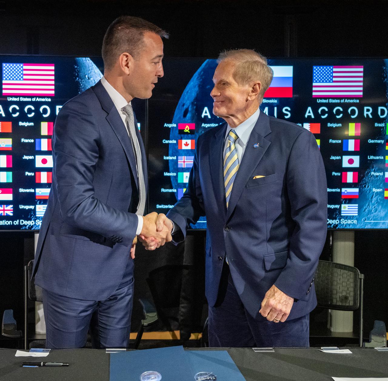 Slovak Republic Minister of Education, Research, Development, and Youth Tomáš Drucker, left, and NASA Administrator Bill Nelson, right, shake hands during an Artemis Accords signing ceremony, Thursday, May 30, 2024, at the Mary W. Jackson NASA Headquarters building in Washington. Slovakia is the 42nd country to sign the Artemis Accords, which establish a practical set of principles to guide space exploration cooperation among nations participating in NASA’s Artemis program. Photo Credit: (NASA/Keegan Barber)