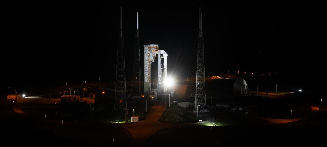 A United Launch Alliance Atlas V rocket with Boeing’s CST-100 Starliner spacecraft aboard is seen illuminated by spotlights on the launch pad at Space Launch Complex 41 ahead of the NASA’s Boeing Crew Flight Test, Thursday, May 30, 2024 at Cape Canaveral Space Force Station in Florida. NASA’s Boeing Crew Flight Test is the first launch with astronauts of the Boeing CFT-100 spacecraft and United Launch Alliance Atlas V rocket to the International Space Station as part of the agency’s Commercial Crew Program. The flight test, targeted for launch at 12:25 p.m. EDT on Saturday, June 1, serves as an end-to-end demonstration of Boeing’s crew transportation system and will carry NASA astronauts Butch Wilmore and Suni Williams to and from the orbiting laboratory. Photo Credit: (NASA/Joel Kowsky)