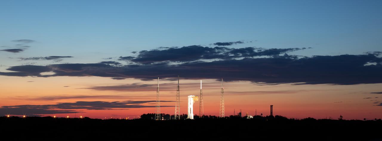 A United Launch Alliance Atlas V rocket with Boeing’s CST-100 Starliner spacecraft aboard is seen at sunset on the launch pad at Space Launch Complex 41 ahead of the NASA’s Boeing Crew Flight Test, Thursday, May 30, 2024 at Cape Canaveral Space Force Station in Florida. NASA’s Boeing Crew Flight Test is the first launch with astronauts of the Boeing CFT-100 spacecraft and United Launch Alliance Atlas V rocket to the International Space Station as part of the agency’s Commercial Crew Program. The flight test, targeted for launch at 12:25 p.m. EDT on Saturday, June 1, serves as an end-to-end demonstration of Boeing’s crew transportation system and will carry NASA astronauts Butch Wilmore and Suni Williams to and from the orbiting laboratory. Photo Credit: (NASA/Joel Kowsky)