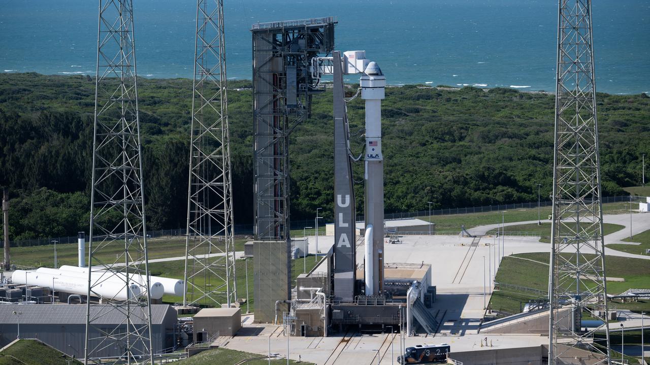 A United Launch Alliance Atlas V rocket with Boeing’s CST-100 Starliner spacecraft aboard is seen on the launch pad at Space Launch Complex 41 ahead of the NASA’s Boeing Crew Flight Test, Friday, May 31, 2024 at Cape Canaveral Space Force Station in Florida. NASA’s Boeing Crew Flight Test is the first launch with astronauts of the Boeing CFT-100 spacecraft and United Launch Alliance Atlas V rocket to the International Space Station as part of the agency’s Commercial Crew Program. The flight test, targeted for launch at 12:25 p.m. EDT on Saturday, June 1, serves as an end-to-end demonstration of Boeing’s crew transportation system and will carry NASA astronauts Butch Wilmore and Suni Williams to and from the orbiting laboratory. Photo Credit: (NASA/Joel Kowsky)