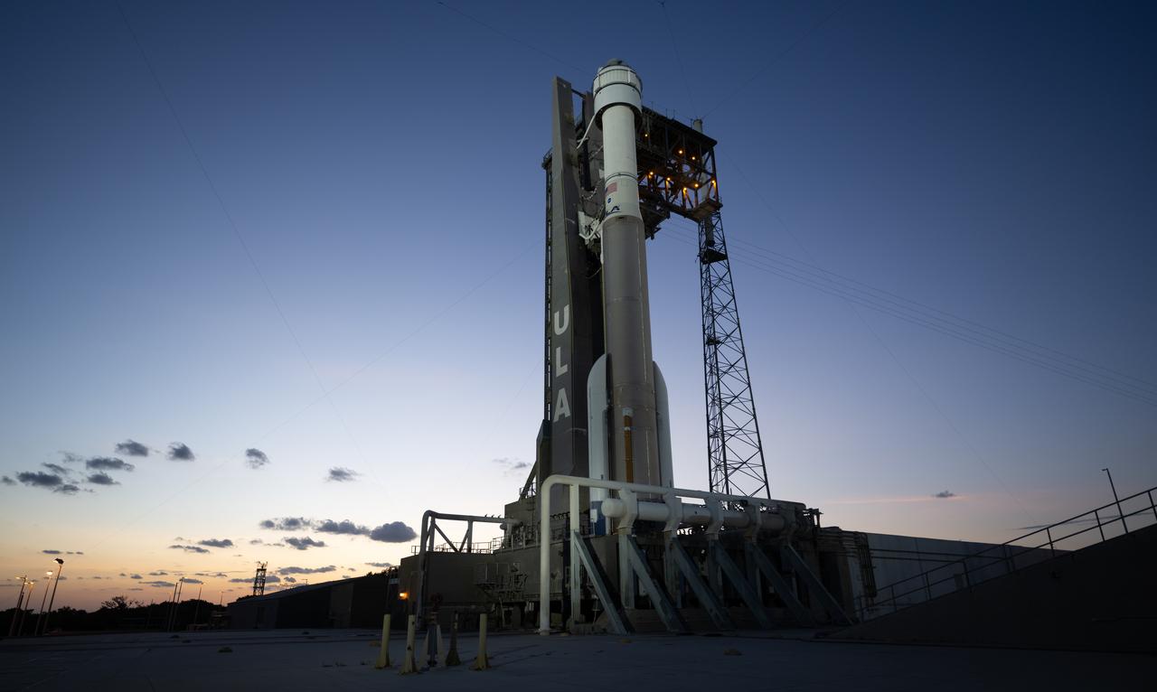 A United Launch Alliance Atlas V rocket with Boeing’s CST-100 Starliner spacecraft aboard is seen at sunset on the launch pad at Space Launch Complex 41 ahead of the NASA’s Boeing Crew Flight Test, Friday, May 31, 2024 at Cape Canaveral Space Force Station in Florida. NASA’s Boeing Crew Flight Test is the first launch with astronauts of the Boeing CFT-100 spacecraft and United Launch Alliance Atlas V rocket to the International Space Station as part of the agency’s Commercial Crew Program. The flight test, targeted for launch at 12:25 p.m. EDT on Saturday, June 1, serves as an end-to-end demonstration of Boeing’s crew transportation system and will carry NASA astronauts Butch Wilmore and Suni Williams to and from the orbiting laboratory. Photo Credit: (NASA/Joel Kowsky)
