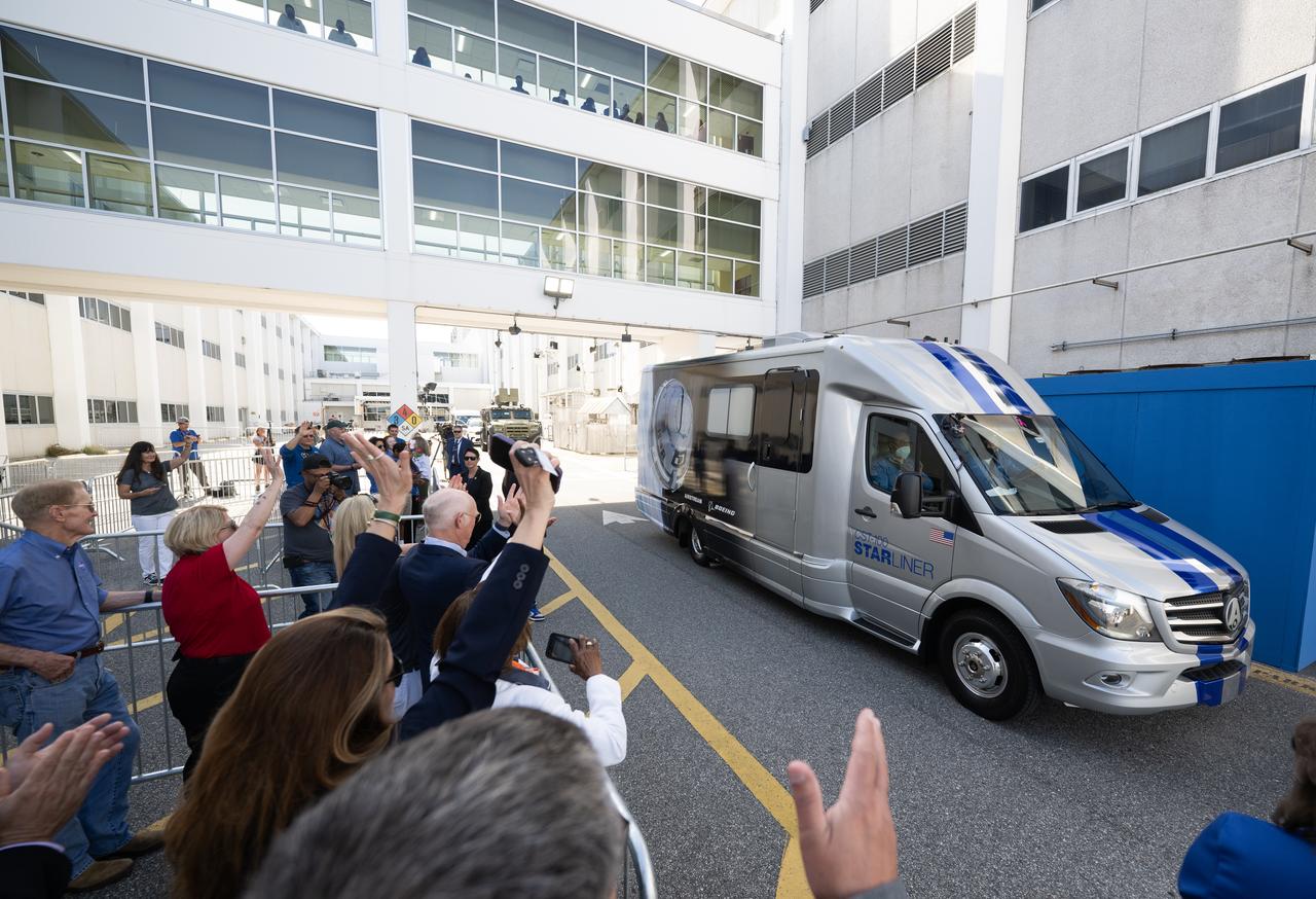NASA, Boeing, and ULA leadership wave as the crew transport vehicle carrying NASA astronauts Suni Williams and Butch Wilmore departs the Neil A. Armstrong Operations and Checkout Building for Launch Complex 41 on Cape Canaveral Space Force Station to board the Boeing CST-100 Starliner spacecraft for the Crew Flight Test launch, Saturday, June 1, 2024, at NASA’s Kennedy Space Center in Florida. NASA’s Boeing Crew Flight Test is the first launch with astronauts of the Boeing CFT-100 spacecraft and United Launch Alliance Atlas V rocket to the International Space Station as part of the agency’s Commercial Crew Program. The flight test, targeted for launch at 12:25 p.m. EDT, serves as an end-to-end demonstration of Boeing’s crew transportation system and will carry NASA astronauts Butch Wilmore and Suni Williams to and from the orbiting laboratory. Photo Credit: (NASA/Joel Kowsky)
