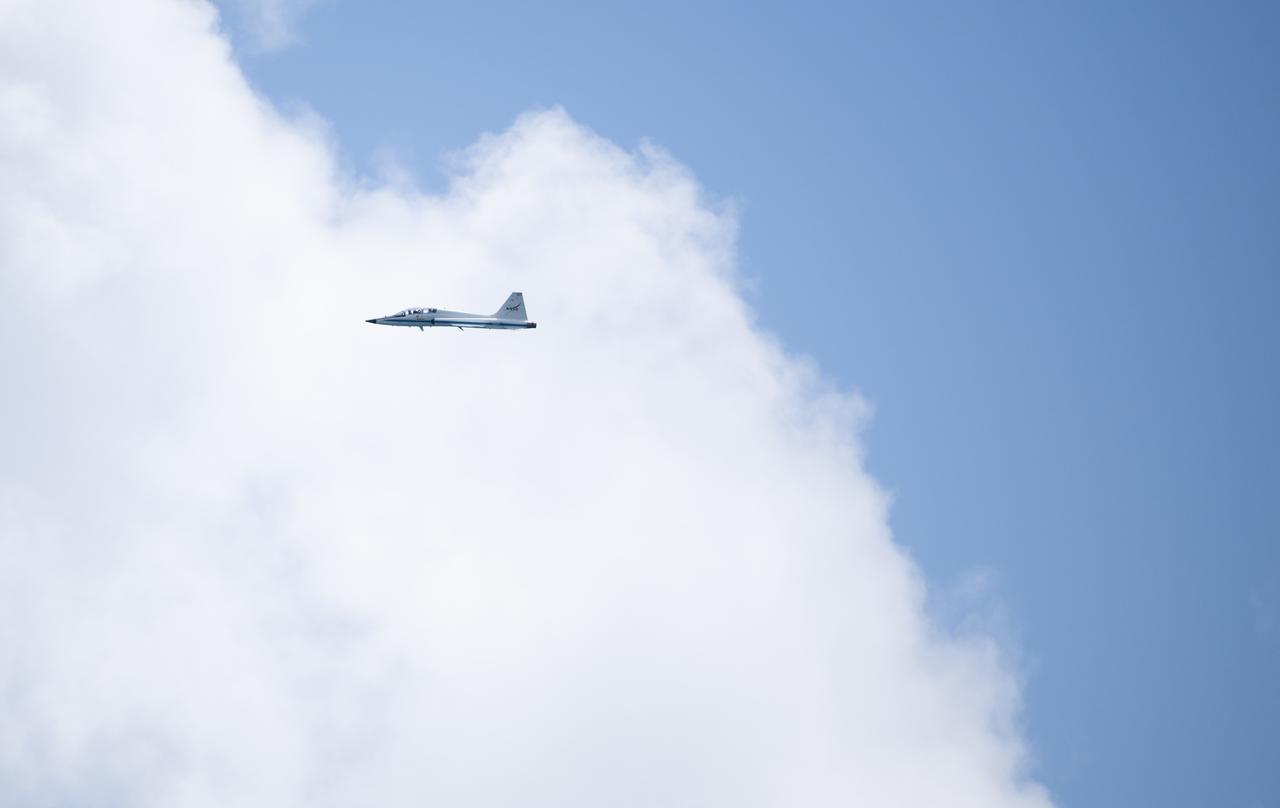 A NASA T-38 Talon is seen as it flies past Space Launch Complex 41 ahead of the NASA’s Boeing Crew Flight Test, Tuesday, June 4, 2024 at Cape Canaveral Space Force Station in Florida. NASA’s Boeing Crew Flight Test is the first launch with astronauts of the Boeing CFT-100 spacecraft and United Launch Alliance Atlas V rocket to the International Space Station as part of the agency’s Commercial Crew Program. The flight test, targeted for launch at 10:52 a.m. EDT on Wednesday, June 5, serves as an end-to-end demonstration of Boeing’s crew transportation system and will carry NASA astronauts Butch Wilmore and Suni Williams to and from the orbiting laboratory. Photo Credit: (NASA/Joel Kowsky)