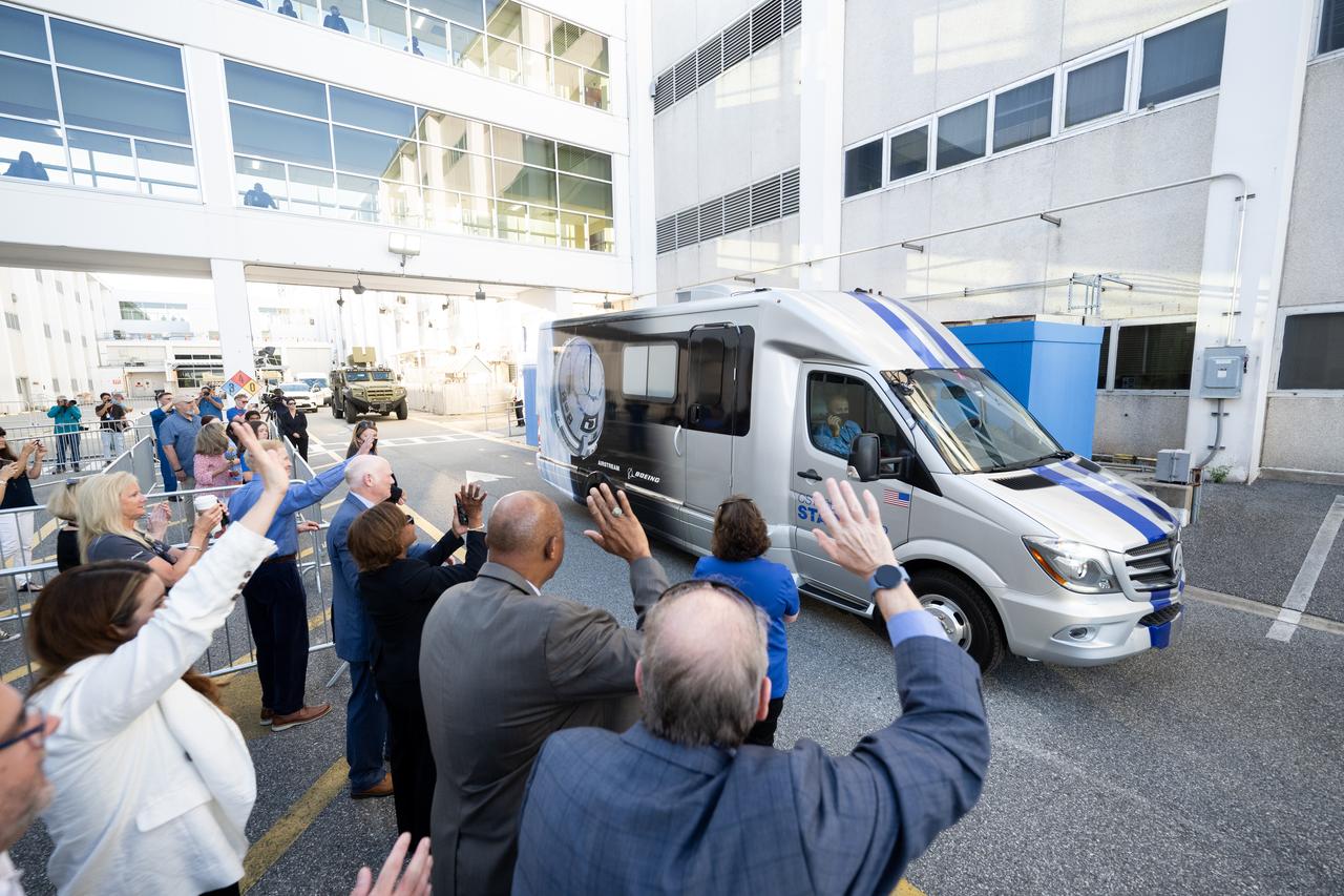NASA, ULA, and Boeing leadership wave as the crew transport vehicle with NASA astronauts Suni Williams and Butch Wilmore departs the Neil A. Armstrong Operations and Checkout Building for Launch Complex 41 on Cape Canaveral Space Force Station to board the Boeing CST-100 Starliner spacecraft for the Crew Flight Test launch, Wednesday, June 5, 2024, at NASA’s Kennedy Space Center in Florida. NASA’s Boeing Crew Flight Test is the first launch with astronauts of the Boeing CFT-100 spacecraft and United Launch Alliance Atlas V rocket to the International Space Station as part of the agency’s Commercial Crew Program. The flight test, targeted for launch at 10:52 a.m. EDT, serves as an end-to-end demonstration of Boeing’s crew transportation system and will carry NASA astronauts Butch Wilmore and Suni Williams to and from the orbiting laboratory. Photo Credit: (NASA/Joel Kowsky)