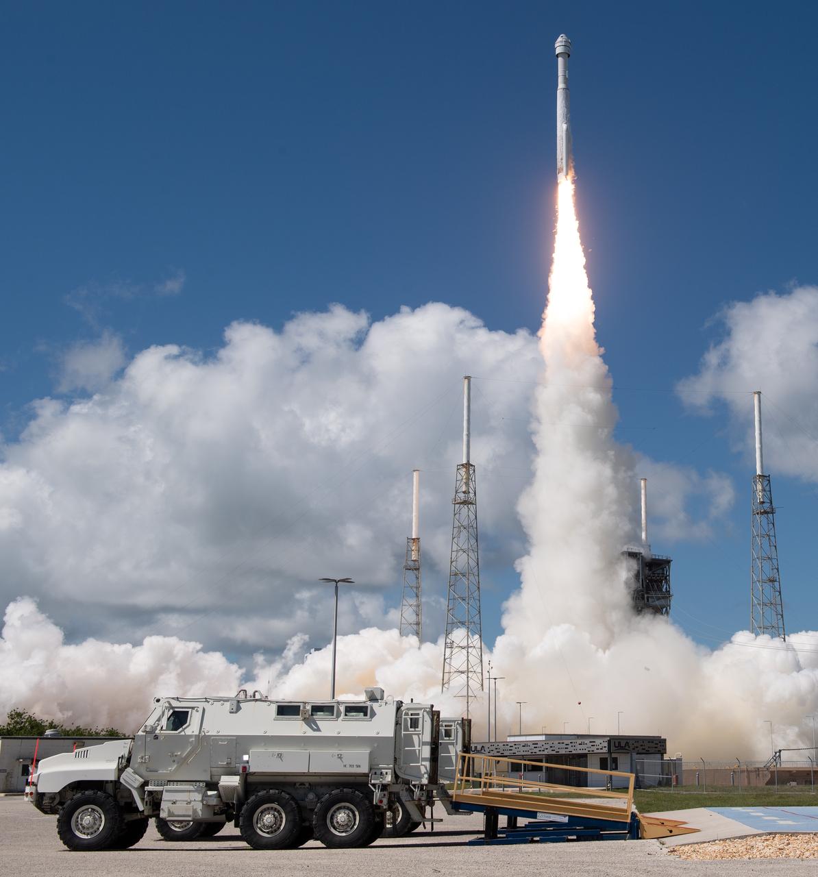 Two emergency egress vehicles are seen position at the slidewire termination area at Space Launch Complex 41 as a United Launch Alliance Atlas V rocket with Boeing’s CST-100 Starliner spacecraft aboard launches from Cape Canaveral Space Force Station, Wednesday, June 5, 2024, in Florida. NASA’s Boeing Crew Flight Test is the first launch with astronauts of the Boeing CFT-100 spacecraft and United Launch Alliance Atlas V rocket to the International Space Station as part of the agency’s Commercial Crew Program. The flight test, which launched at 10:52 a.m. EDT, serves as an end-to-end demonstration of Boeing’s crew transportation system and will carry NASA astronauts Butch Wilmore and Suni Williams to and from the orbiting laboratory. Photo Credit: (NASA/Joel Kowsky)