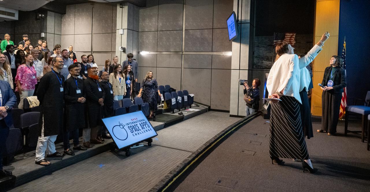 NASA Earth Science Division Director Karen St. Germain and NASA Earth Science Division Associate Administrator Nicola Fox pose for a selfie with guests during a gathering of NASA Space Apps Challenge Global Winners and Local Leads from around the world Wednesday, June 5, 2024, at the Mary W. Jackson NASA Headquarters building in Washington. Photo Credit: (NASA/Keegan Barber)