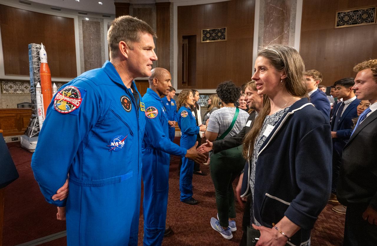 CSA (Canadian Space Agency) astronaut Jeremy Hansen, left, speaks with guests during a reception with Artemis II crew members Wednesday, June 5, 2024, at the Dirksen Senate Office Building in Washington. Photo Credit: (NASA/Keegan Barber)
