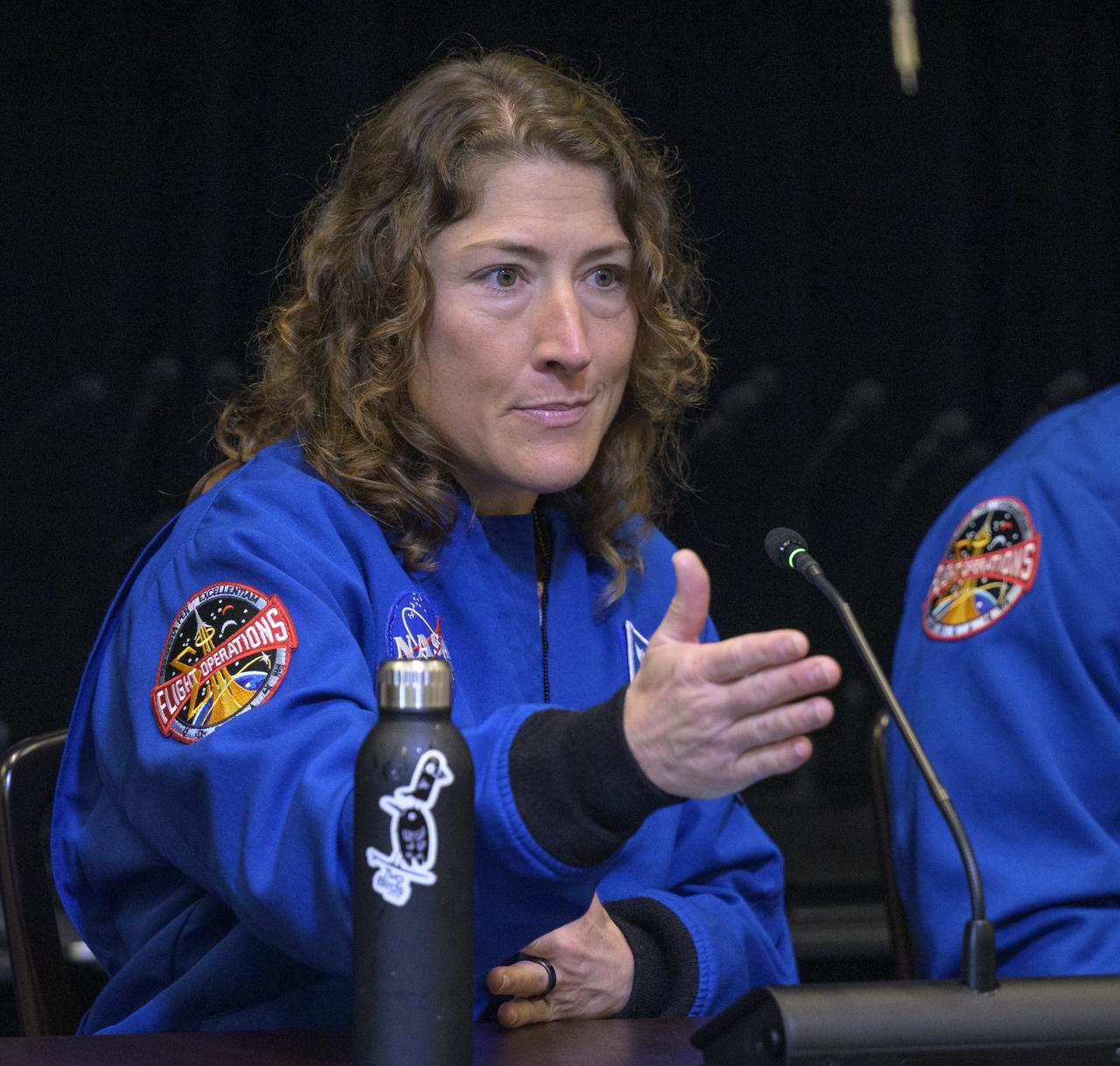 NASA astronaut Christina Koch gives remarks during a White House staff briefing along with her fellow Artemis II crew, NASA astronauts Reid Wiseman, Victor Glover, and Canadian Space Agency (CSA) astronaut Jeremy Hansen, Thursday, June 6, 2024, at the Eisenhower Executive Office Building in Washington. Photo Credit: (NASA/Bill Ingalls)