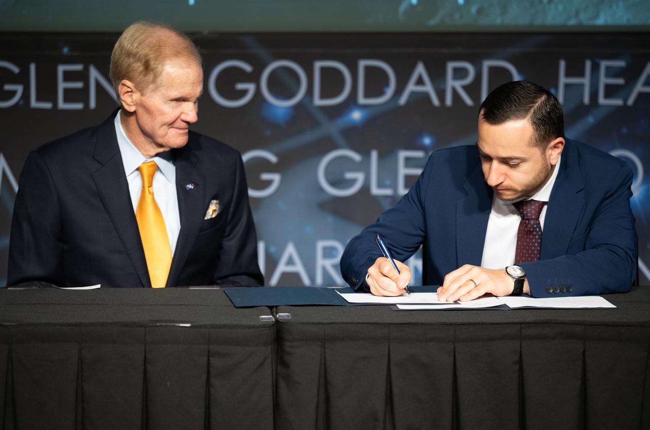 NASA Administrator Bill Nelson looks on as Mkhitar Hayrapetyan, Minister of High-Tech Industry of the Republic of Armenia, signs the Artemis Accords, Wednesday, June 12, 2024, at the Mary W. Jackson NASA Headquarters building in Washington. The Republic of Armenia is the 43rd country to sign the Artemis Accords, which establish a practical set of principles to guide space exploration cooperation among nations participating in NASA’s Artemis program.  Photo Credit: (NASA/Joel Kowsky)