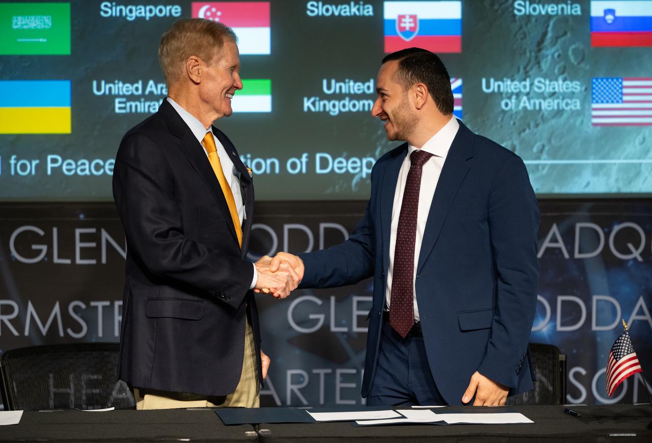 NASA Administrator Bill Nelson, left, and Mkhitar Hayrapetyan, Minister of High-Tech Industry of the Republic of Armenia, shake hands after the signing of the Artemis Accords, Wednesday, June 12, 2024, at the Mary W. Jackson NASA Headquarters building in Washington. The Republic of Armenia is the 43rd country to sign the Artemis Accords, which establish a practical set of principles to guide space exploration cooperation among nations participating in NASA’s Artemis program.  Photo Credit: (NASA/Joel Kowsky)