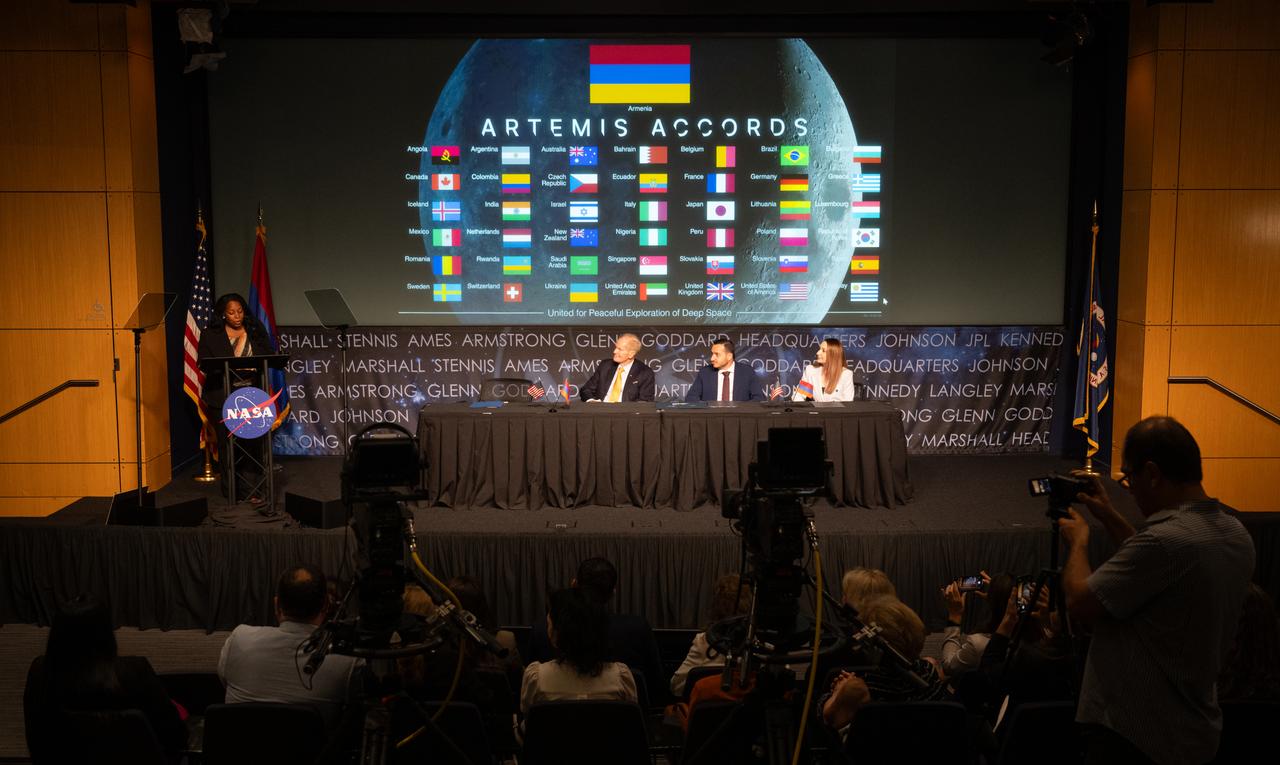 Acting Assistant Secretary of State for the Bureau of Oceans and International Environmental and Scientific Affairs Jennifer Littlejohn, left, delivers remarks during an Artemis Accords signing ceremony as NASA Administrator Bill Nelson, Mkhitar Hayrapetyan, Minister of High-Tech Industry of the Republic of Armenia, and Ambassador of the Republic of Armenia to the United States Lilit Makunts, Wednesday, June 12, 2024, at the Mary W. Jackson NASA Headquarters building in Washington. The Republic of Armenia is the 43rd country to sign the Artemis Accords, which establish a practical set of principles to guide space exploration cooperation among nations participating in NASA’s Artemis program.  Photo Credit: (NASA/Joel Kowsky)