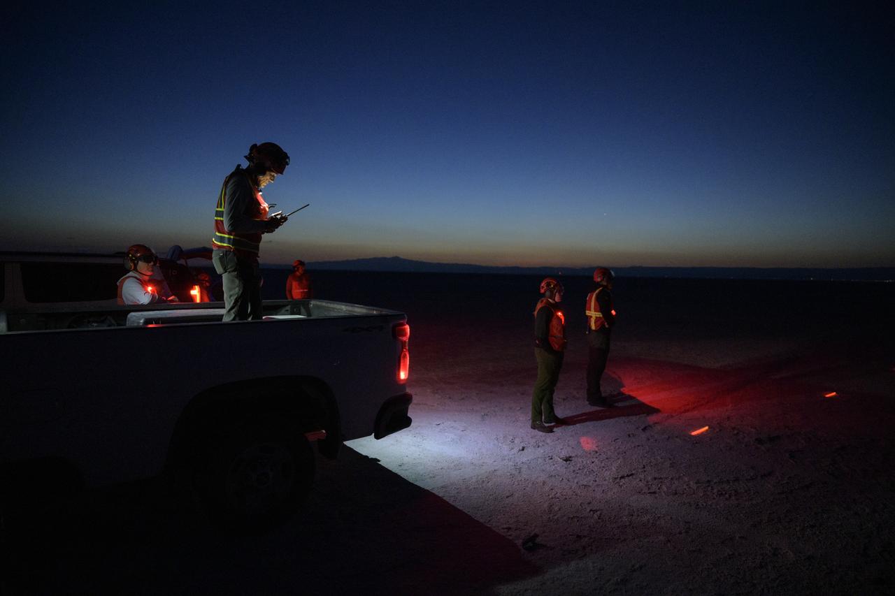 Boeing and NASA teams participate in a mission dress rehearsal to prepare for the landing of the Boeing CST-100 Starliner spacecraft in White Sands, New Mexico, Sunday, June 16, 2024. NASA astronauts Butch Wilmore and Suni Williams are Starliner’s first human crew and travelled to the International Space Station as part of NASA's Boeing Crew Flight Test. The mission serves as an end-to-end demonstration of Boeing’s crew transportation system as a provider for NASA’s Commercial Crew Program. Photo Credit: (NASA/Bill Ingalls)