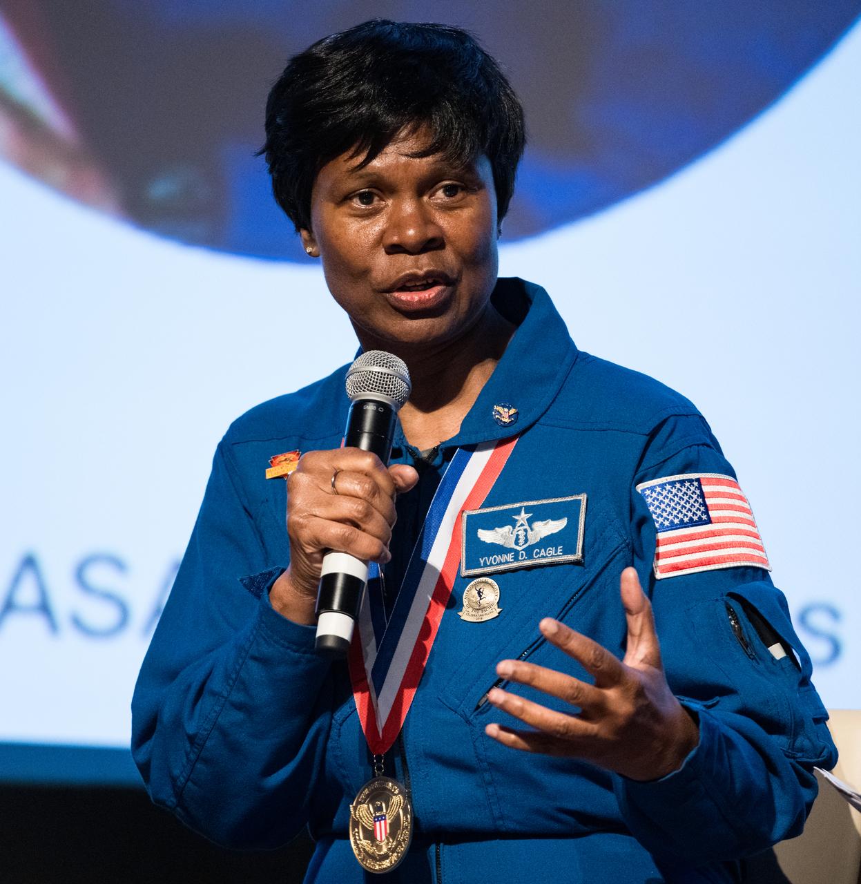 Dr. Yvonne Cagle, NASA astronaut, speaks at an event to commemorate Black Space Week (BSW) 2024 titled, "Beyond the Color Lines From Science Fiction to Science Fact," in the Oprah Winfrey Theater at the Smithsonian National Museum of African American History and Culture, Monday, June 17, 2024 in Washington. Photo Credit: (NASA/Aubrey Gemignani)