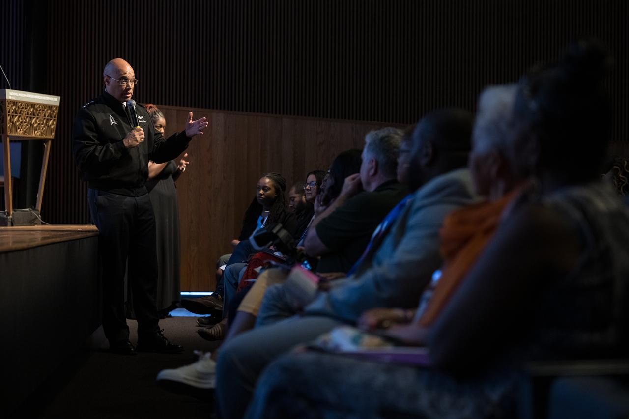 Lt. General David Miller Jr., commander, Space Operations Command, answers a question at an event to commemorate Black Space Week (BSW) 2024 titled, "Beyond the Color Lines From Science Fiction to Science Fact," in the Oprah Winfrey Theater at the Smithsonian National Museum of African American History and Culture, Monday, June 17, 2024 in Washington. Photo Credit: (NASA/Aubrey Gemignani)