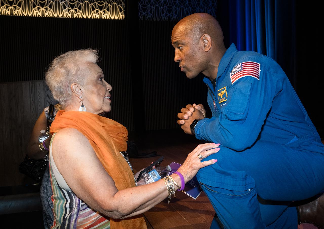 Joylette Goble Hylick, daughter of Katherine Johnson, speaks to NASA astronaut Victor Glover at the conclusion of an event to commemorate Black Space Week (BSW) 2024 titled, "Beyond the Color Lines From Science Fiction to Science Fact," in the Oprah Winfrey Theater at the Smithsonian National Museum of African American History and Culture, Monday, June 17, 2024 in Washington. Photo Credit: (NASA/Aubrey Gemignani)