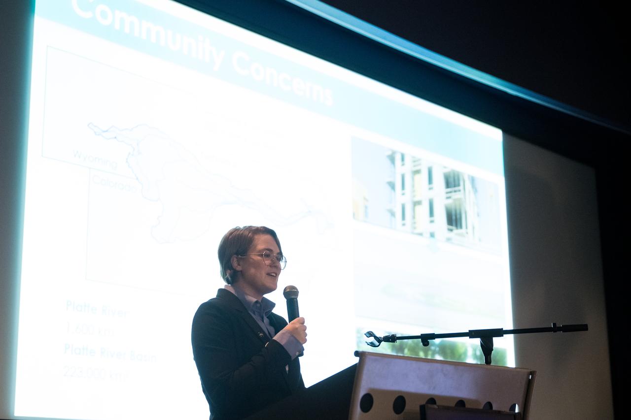 Olivia Kirkland speaks about her project, Platte River Basin Water Resources II, Tuesday, August 6, 2024, at the Mary W. Jackson NASA Headquarters building in Washington. Every summer early career researchers from NASA’s DEVELOP National Program come to NASA Headquarters and present their research projects. DEVELOP is a training and development program where early career researchers work on Earth science projects, mentored by science advisors from NASA and partner agencies, and provide research results to local communities. Photo Credit: (NASA/Aubrey Gemignani)
