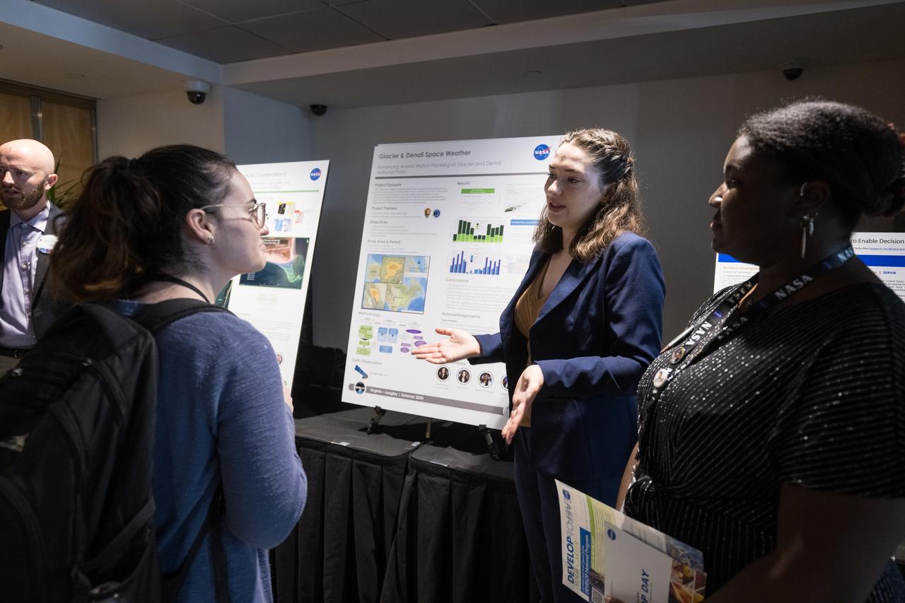 A DEVELOP researcher speaks about her project, Tuesday, August 6, 2024, at the Mary W. Jackson NASA Headquarters building in Washington. Every summer early career researchers from NASA’s DEVELOP National Program come to NASA Headquarters and present their research projects. DEVELOP is a training and development program where early career researchers work on Earth science projects, mentored by science advisors from NASA and partner agencies, and provide research results to local communities. Photo Credit: (NASA/Aubrey Gemignani)