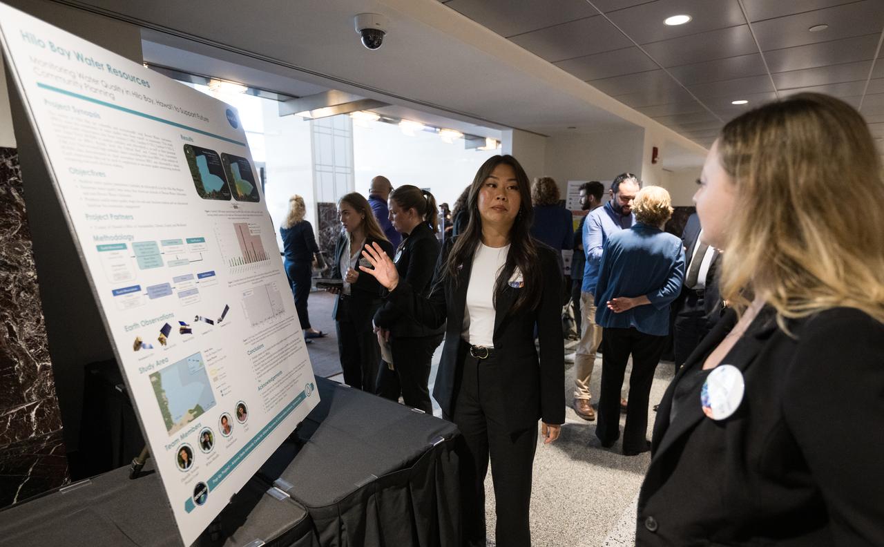 A DEVELOP researcher speaks about her project, Tuesday, August 6, 2024, at the Mary W. Jackson NASA Headquarters building in Washington. Every summer early career researchers from NASA’s DEVELOP National Program come to NASA Headquarters and present their research projects. DEVELOP is a training and development program where early career researchers work on Earth science projects, mentored by science advisors from NASA and partner agencies, and provide research results to local communities. Photo Credit: (NASA/Aubrey Gemignani)
