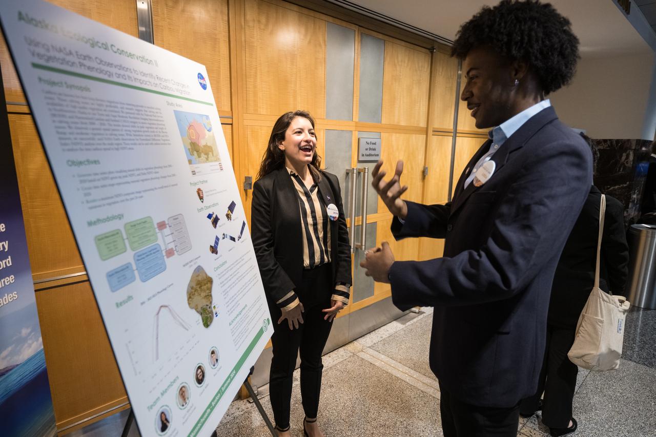 Jackie Encinas speaks about her project, Alaska Ecological Conservation II, Tuesday, August 6, 2024, at the Mary W. Jackson NASA Headquarters building in Washington. Every summer early career researchers from NASA’s DEVELOP National Program come to NASA Headquarters and present their research projects. DEVELOP is a training and development program where early career researchers work on Earth science projects, mentored by science advisors from NASA and partner agencies, and provide research results to local communities. Photo Credit: (NASA/Aubrey Gemignani)