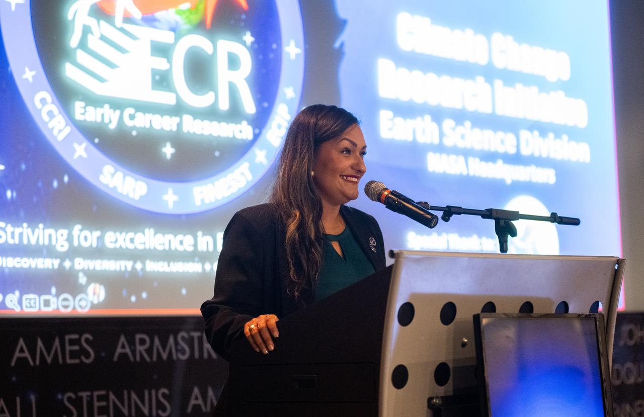 Yaítza Luna-Cruz, a program executive in the Earth Science Division of NASA’s Science Mission Directorate and program manager for the Early Career Research Program, speaks to the Climate Change Research Initiative (CCRI) cohort, Wednesday, Aug. 7, 2024, at the Mary W. Jackson NASA Headquarters building in Washington, DC. The Earth Science Division’s Early Career Research Program’s Climate Change Research Initiative (CCRI) is a year-long STEM engagement and experiential learning opportunity for educators and students from high school to graduate level. Photo Credit: (NASA/Joel Kowsky)