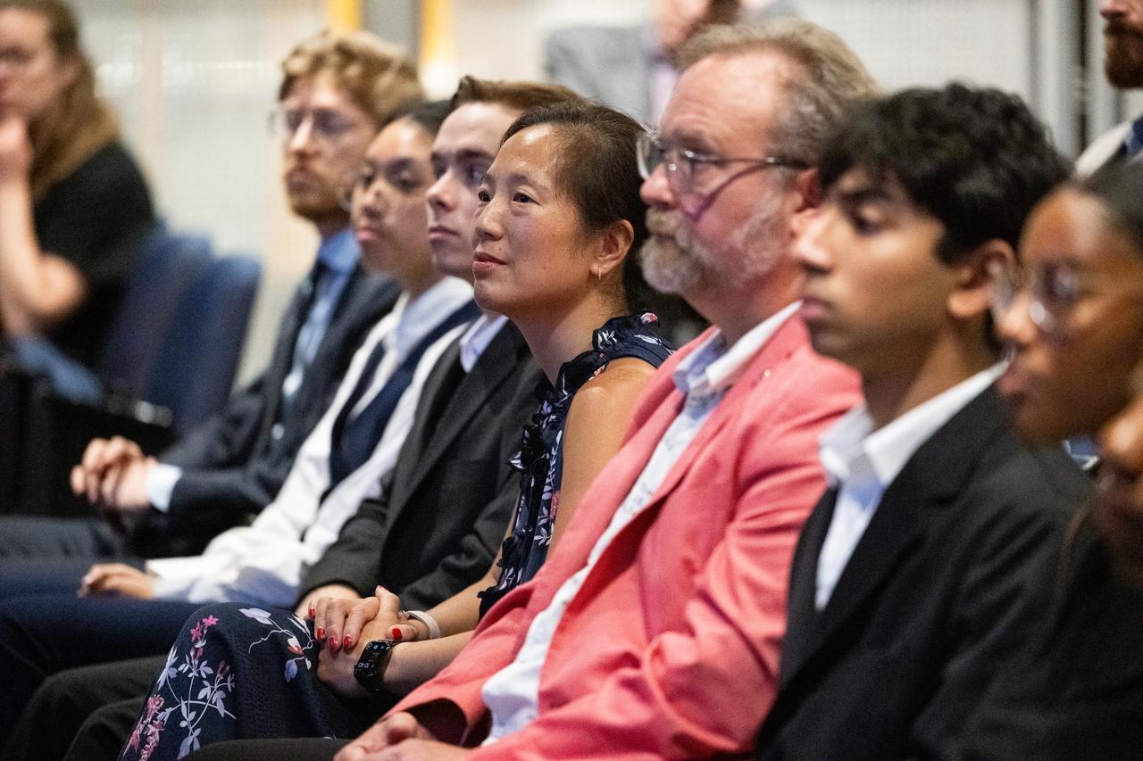 Members of the Climate Change Research Initiative (CCRI) cohort listen as Karen St. Germain, director of the Earth Science Division of NASA’s Science Mission Directorate speaks, Wednesday, Aug. 7, 2024, at the Mary W. Jackson NASA Headquarters building in Washington, DC. The Earth Science Division’s Early Career Research Program’s Climate Change Research Initiative (CCRI) is a year-long STEM engagement and experiential learning opportunity for educators and students from high school to graduate level. Photo Credit: (NASA/Joel Kowsky)