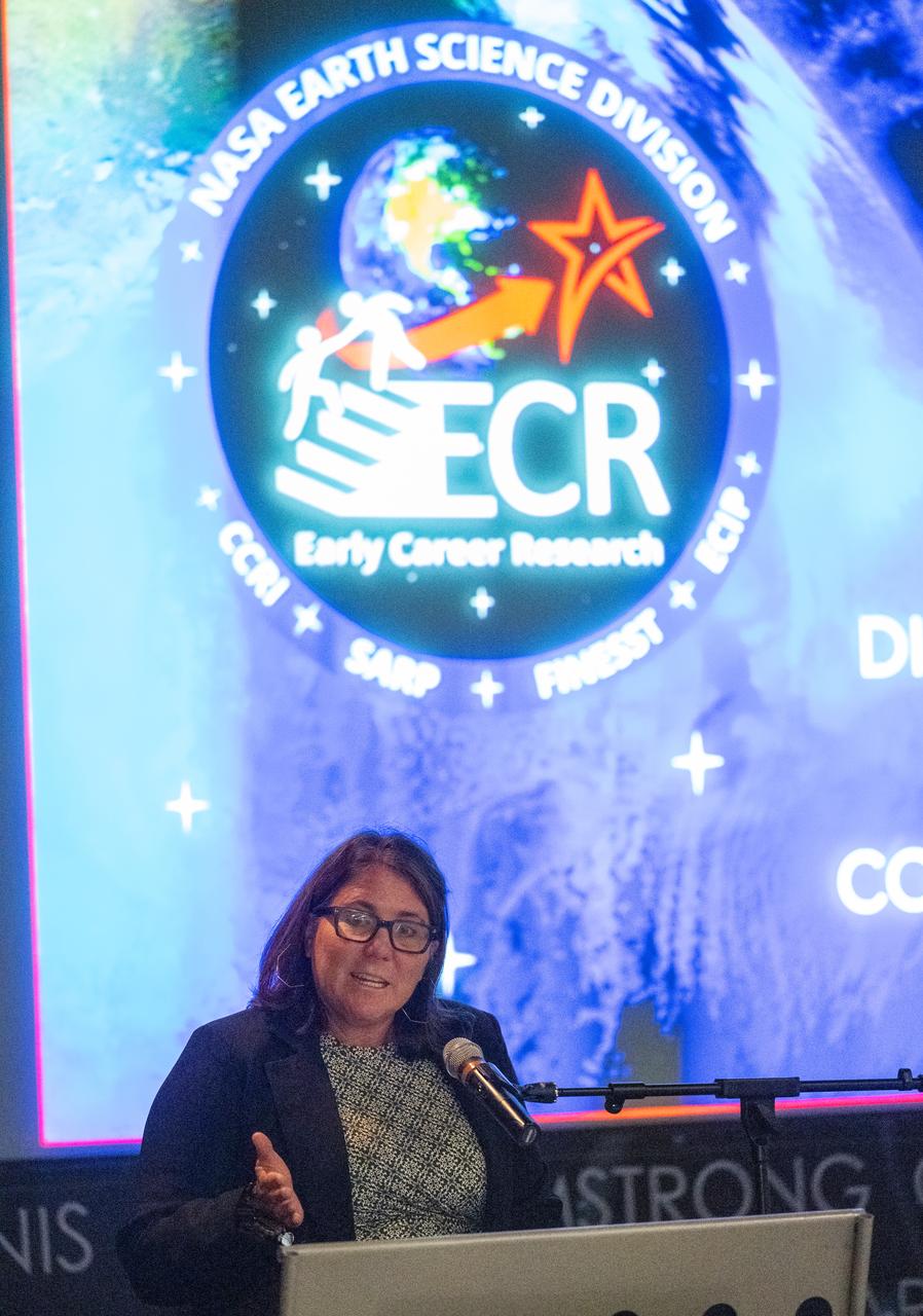 Cynthia Hall, support scientist for the Early Career Research Program in NASA’s Earth Science Division, speaks to the Climate Change Research Initiative (CCRI) cohort, Wednesday, Aug. 7, 2024, at the Mary W. Jackson NASA Headquarters building in Washington, DC. The Earth Science Division’s Early Career Research Program’s Climate Change Research Initiative (CCRI) is a year-long STEM engagement and experiential learning opportunity for educators and students from high school to graduate level. Photo Credit: (NASA/Joel Kowsky)