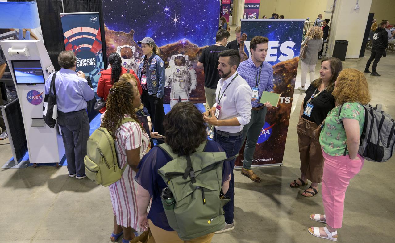 NASA participates in the Podcast Movement conference, Tuesday, Aug. 20, 2024, at the Gaylord National Resort and Convention Center in National Harbor, Md. During the event, NASA hosted a panel entitled, "Eclipses, Moon Missions, and Climate Change: How NASA Reaches Curious Listeners." Photo Credit: (NASA/Bill Ingalls)