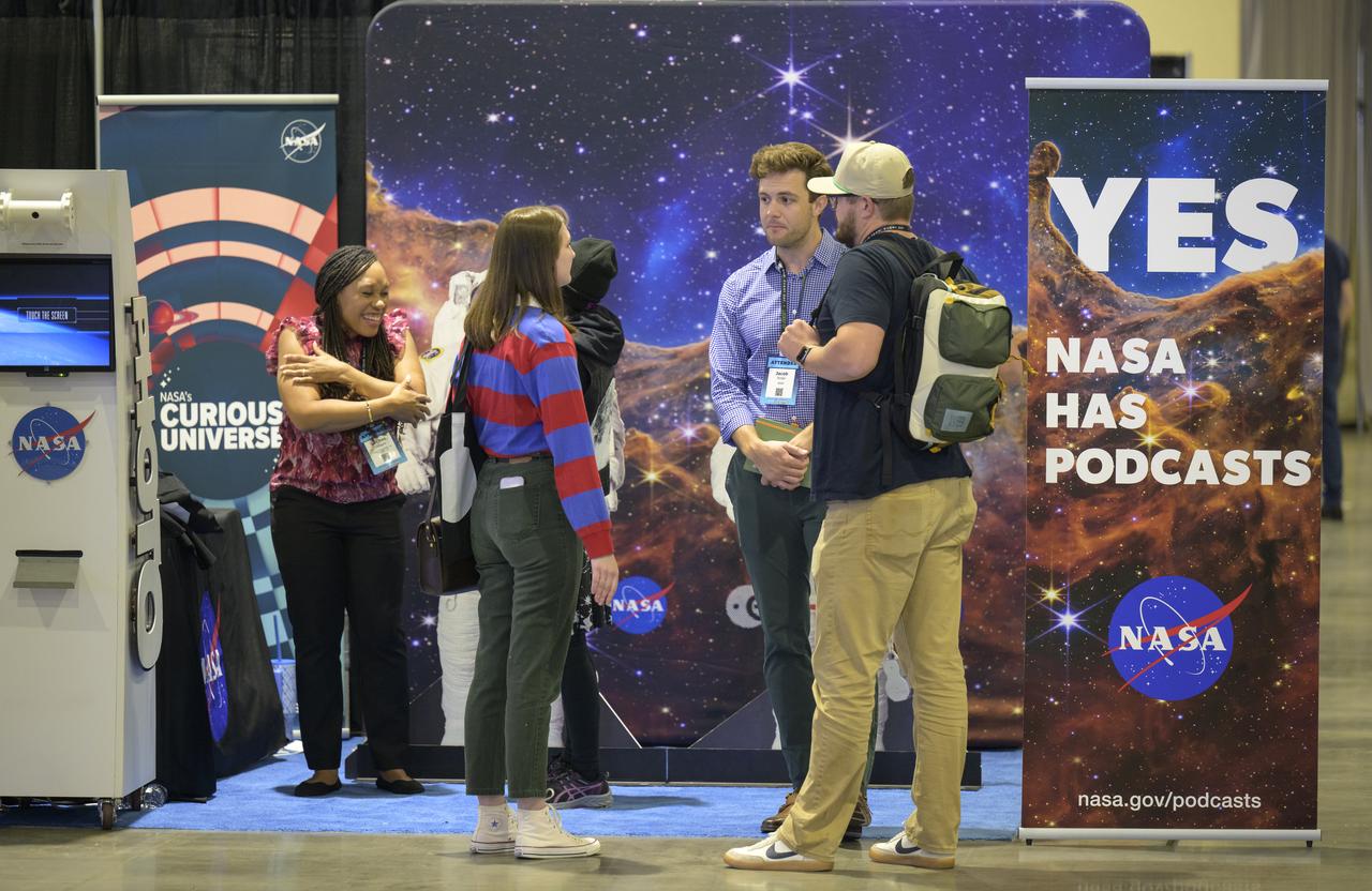 NASA participates in the Podcast Movement conference, Tuesday, Aug. 20, 2024, at the Gaylord National Resort and Convention Center in National Harbor, Md. During the event, NASA hosted a panel entitled, "Eclipses, Moon Missions, and Climate Change: How NASA Reaches Curious Listeners." Photo Credit: (NASA/Bill Ingalls)