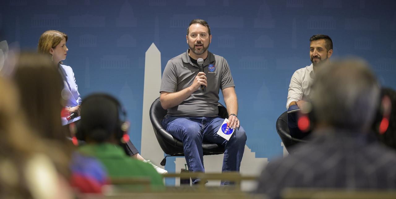 NASA Multimedia Producer and Host of Houston, We Have a Podcast Dane Turner, is seen during a Podcast Movement, NASA hosted a panel entitled, "Eclipses, Moon Missions, and Climate Change: How NASA Reaches Curious Listeners", Tuesday, Aug. 20, 2024, at the Gaylord National Resort and Convention Center in National Harbor, Md. Photo Credit: (NASA/Bill Ingalls)