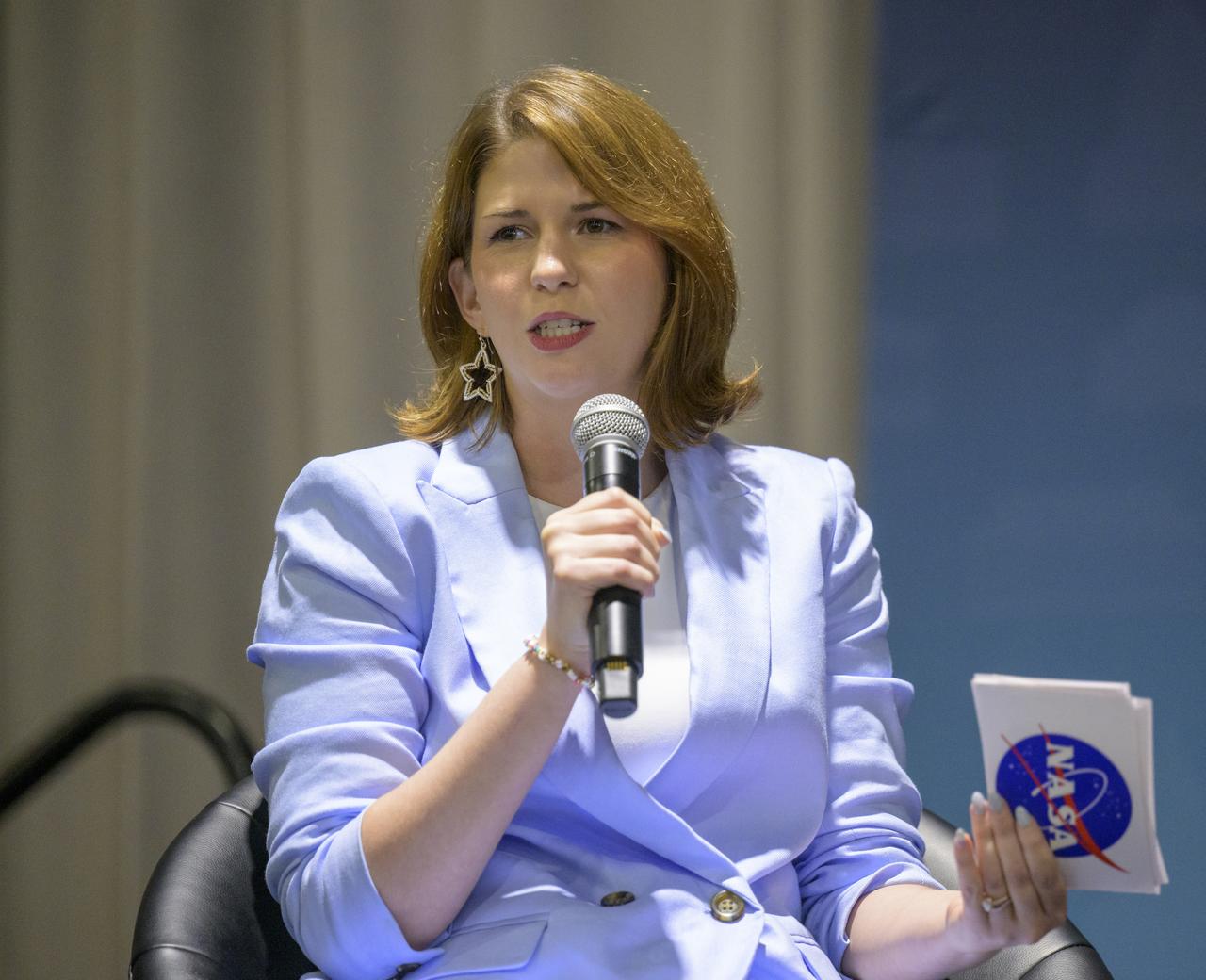 NASA Audio Lead Katie Konans is seen during a Podcast Movement, NASA hosted a panel entitled, "Eclipses, Moon Missions, and Climate Change: How NASA Reaches Curious Listeners", Tuesday, Aug. 20, 2024, at the Gaylord National Resort and Convention Center in National Harbor, Md. Photo Credit: (NASA/Bill Ingalls)
