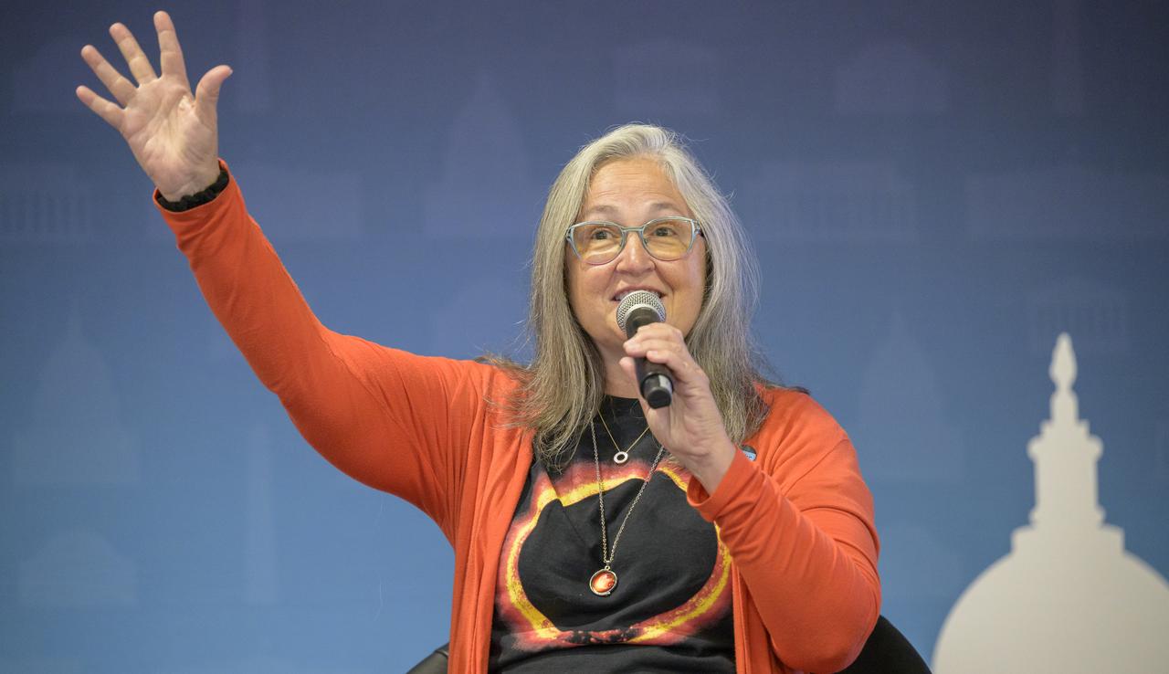 NASA Astrophysicist and Host of NASA's Curious Universe podcast Padi Boyd is seen during a Podcast Movement, NASA hosted a panel entitled, "Eclipses, Moon Missions, and Climate Change: How NASA Reaches Curious Listeners", Tuesday, Aug. 20, 2024, at the Gaylord National Resort and Convention Center in National Harbor, Md. Photo Credit: (NASA/Bill Ingalls)