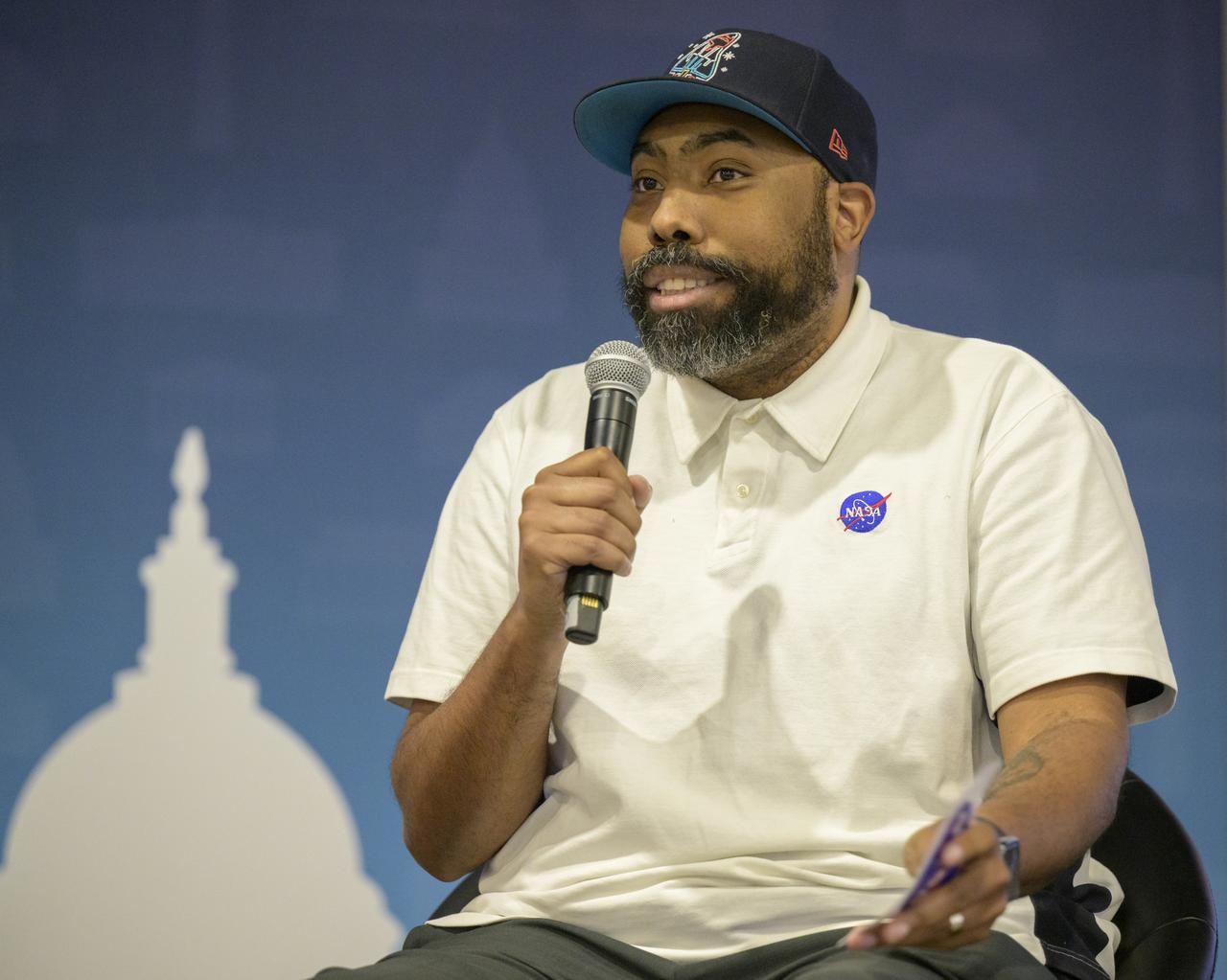 NASA Audio Engineer Manny Cooper is seen during a Podcast Movement, NASA hosted a panel entitled, "Eclipses, Moon Missions, and Climate Change: How NASA Reaches Curious Listeners", Tuesday, Aug. 20, 2024, at the Gaylord National Resort and Convention Center in National Harbor, Md. Photo Credit: (NASA/Bill Ingalls)