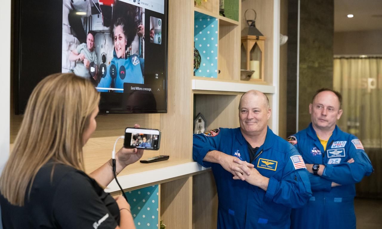 NASA Astronauts Butch Wilmore, left, and Suni Williams, speak with Boeing and NASA landing teams by phone from the International Space Station, before the landing of NASA’s Boeing Crew Flight Test Starliner spacecraft, Friday, Sept. 6, 2024, in Las Cruces, New Mexico. The uncrewed spacecraft is scheduled to land at White Sands Missile Range’s Space Harbor later today, Mountain Time (Sept. 7 Eastern Time). This approach allows NASA and Boeing to continue gathering testing data. Photo Credit: (NASA/Aubrey Gemignani)