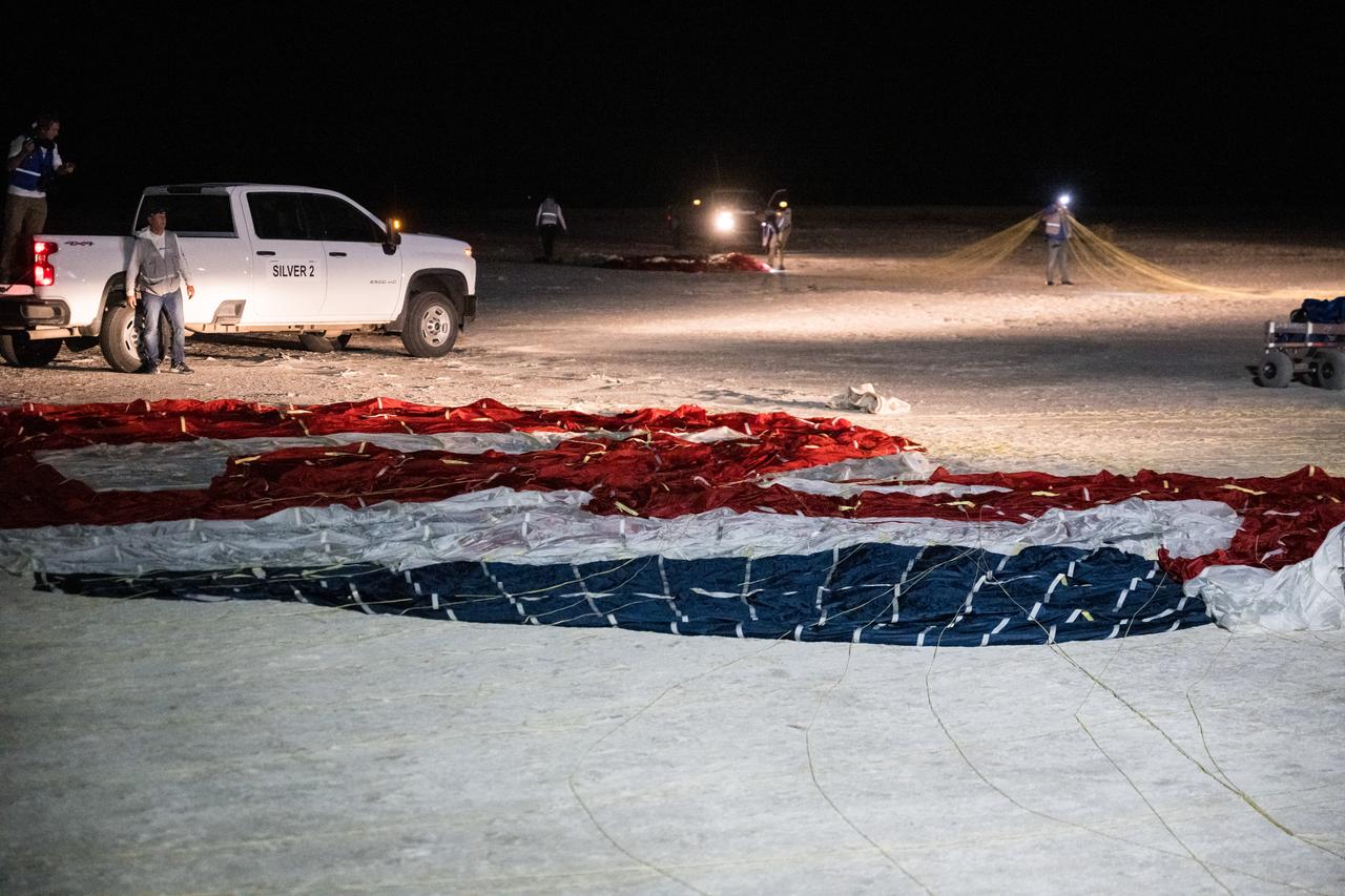 NASA's Boeing Crew Flight Test Starliner spacecraft parachute is seen after the spacecraft landed uncrewed at White Sands Missile Range’s Space Harbor, Friday, Sept. 6, 2024 Mountain Time (Sept. 7 Eastern Time), in New Mexico. This approach allows NASA and Boeing to continue gathering testing data on the spacecraft. Photo Credit: (NASA/Aubrey Gemignani)
