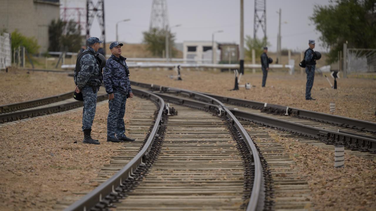 Security teams prepare for the rollout of the Soyuz rocket by train to the launch pad at Site 31, Sunday, Sept. 8, 2024, at the Baikonur Cosmodrome in Kazakhstan. Expedition 72 crew members: NASA astronaut Don Pettit, Roscosmos cosmonauts Alexey Ovchinin, and Ivan Vagner, are scheduled to launch aboard their Soyuz MS-26 spacecraft on September 11. Photo Credit: (NASA/Bill Ingalls)