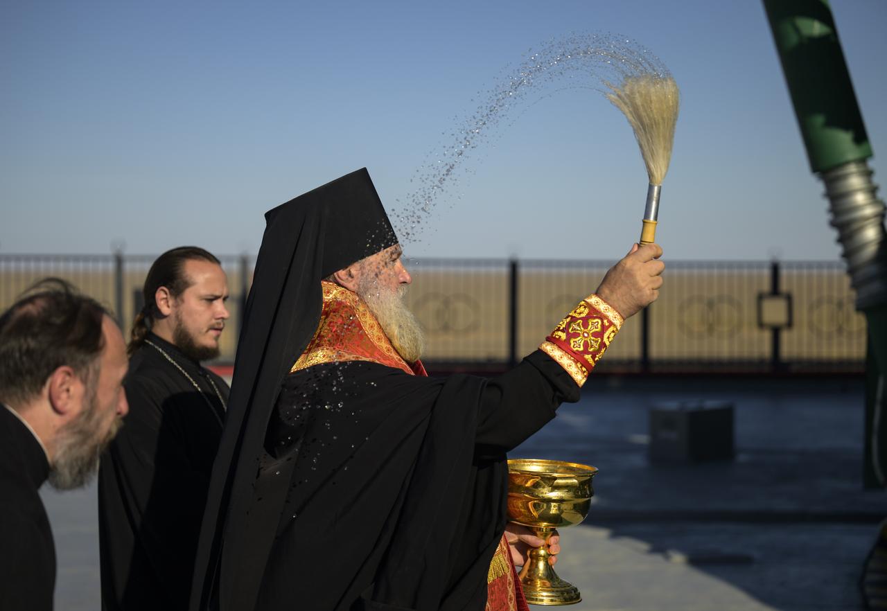 Bishop Ignatii of Kyzylorda and Aktobe blesses the Soyuz rocket, Tuesday, Sept. 10, 2024, at the Baikonur Cosmodrome site 31 launch in Kazakhstan. Expedition 72 crew members: NASA astronaut Don Pettit, Roscosmos cosmonauts Alexey Ovchinin, and Ivan Vagner, are scheduled to launch aboard their Soyuz MS-26 spacecraft on September 11. Photo Credit: (NASA/Bill Ingalls)