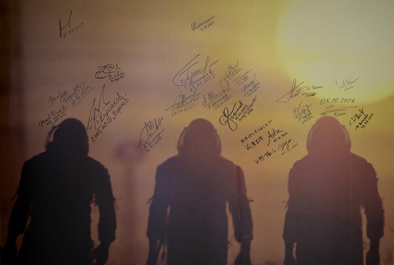A mural with signatures of astronauts and cosmonauts is seen inside the Cosmonaut Hotel, Wednesday, Sept. 11, 2024, in Baikonur, Kazakhstan. Expedition 72 crew members: NASA astronaut Don Pettit, Roscosmos cosmonauts Alexey Ovchinin, and Ivan Vagner, will sign the mural prior to launching to the International Space Station. Photo Credit: (NASA/Bill Ingalls)