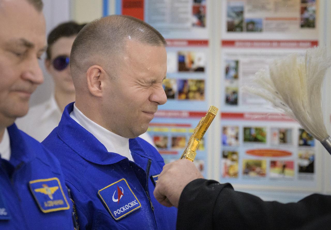 Roscosmos cosmonaut Ivan Vagner receives the traditional blessing at the Cosmonaut Hotel prior to departing for suit-up and launch on a Soyuz rocket with fellow crew mates, Roscosmos cosmonaut Alexey Ovchinin, and NASA astronaut Don Pettit, Wednesday, Sept. 11, 2024, in Baikonur, Kazakhstan. The launch will send Pettit, Ovchinin, and Vagner on a mission to the International Space Station. Photo Credit: (NASA/Bill Ingalls)