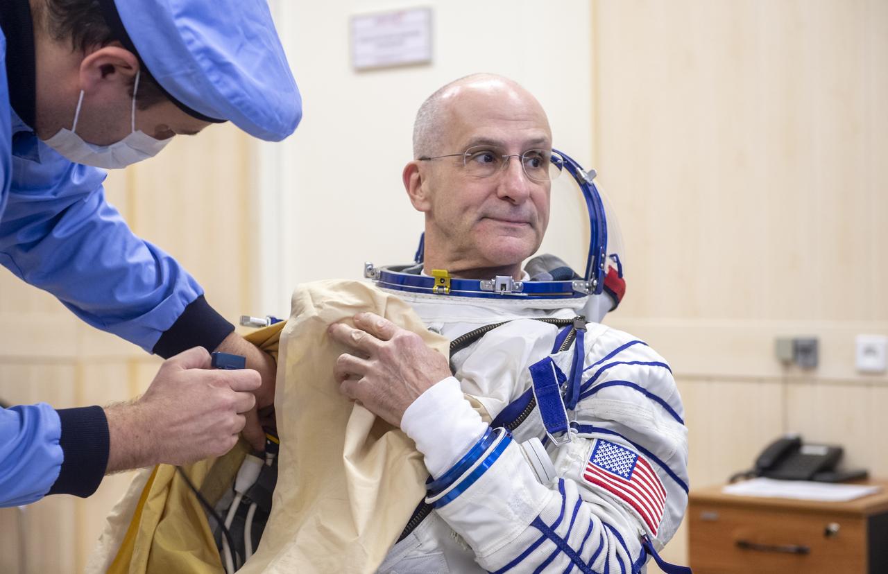NASA astronaut Don Pettit is helped into his Russian Sokol suit as he and fellow crew mates, Roscosmos cosmonauts Alexey Ovchinin, and Ivan Vagner, prepare for their Soyuz launch to the International Space Station Wednesday, Sept. 11, 2024 in Baikonur, Kazakhstan. The launch will send Pettit, Ovchinin, and Vagner on a mission to the International Space Station. Photo Credit: (NASA/GCTC/Andrey Shelepin)