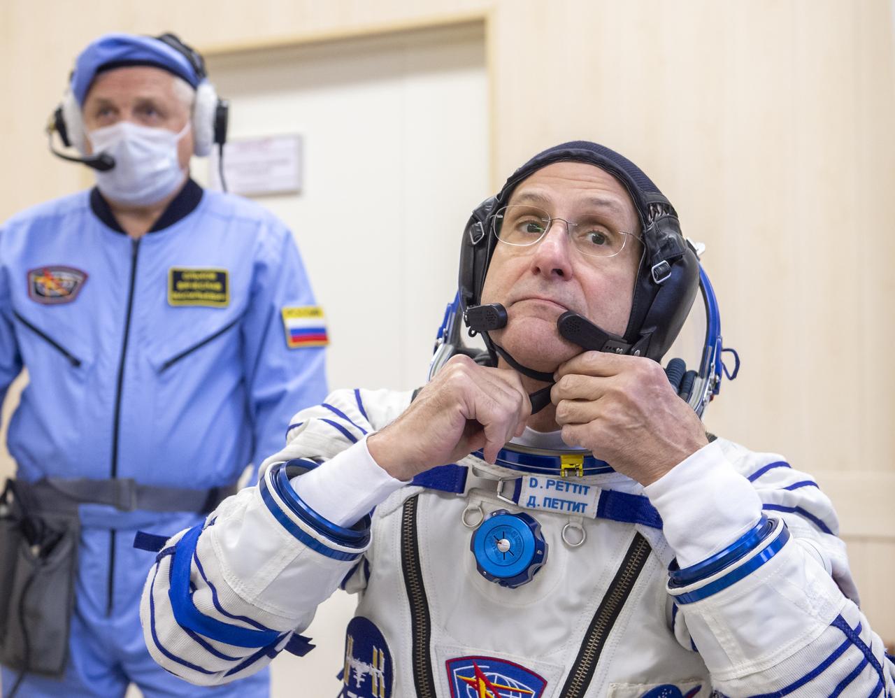 NASA astronaut Don Pettit is helped into his Russian Sokol suit as he and fellow crew mates, Roscosmos cosmonauts Alexey Ovchinin, and Ivan Vagner, prepare for their Soyuz launch to the International Space Station Wednesday, Sept. 11, 2024 in Baikonur, Kazakhstan. The launch will send Pettit, Ovchinin, and Vagner on a mission to the International Space Station. Photo Credit: (NASA/GCTC/Andrey Shelepin)